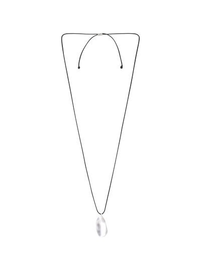 The TIGERMIST ERRIS PENDANT NECKLACE - CREAM features a minimalist design with an adjustable long black cord and a clear teardrop pendant, shown on a plain white background.