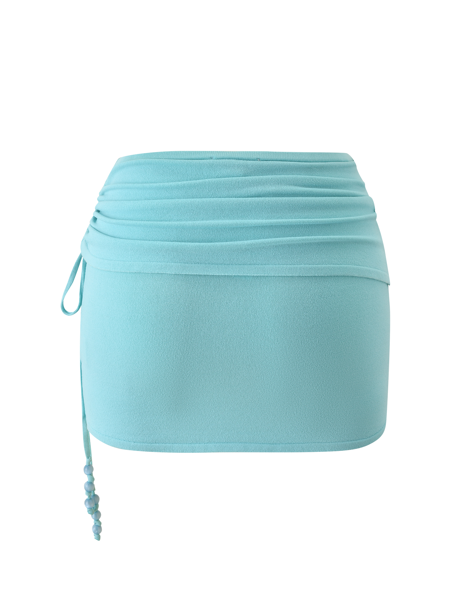 The JASMINA KNIT MINI SKIRT - BLUE by TIGERMIST features a light blue knit design with a draped ruched waistband and side drawstring detailed with small blue beads, shown against a white background.