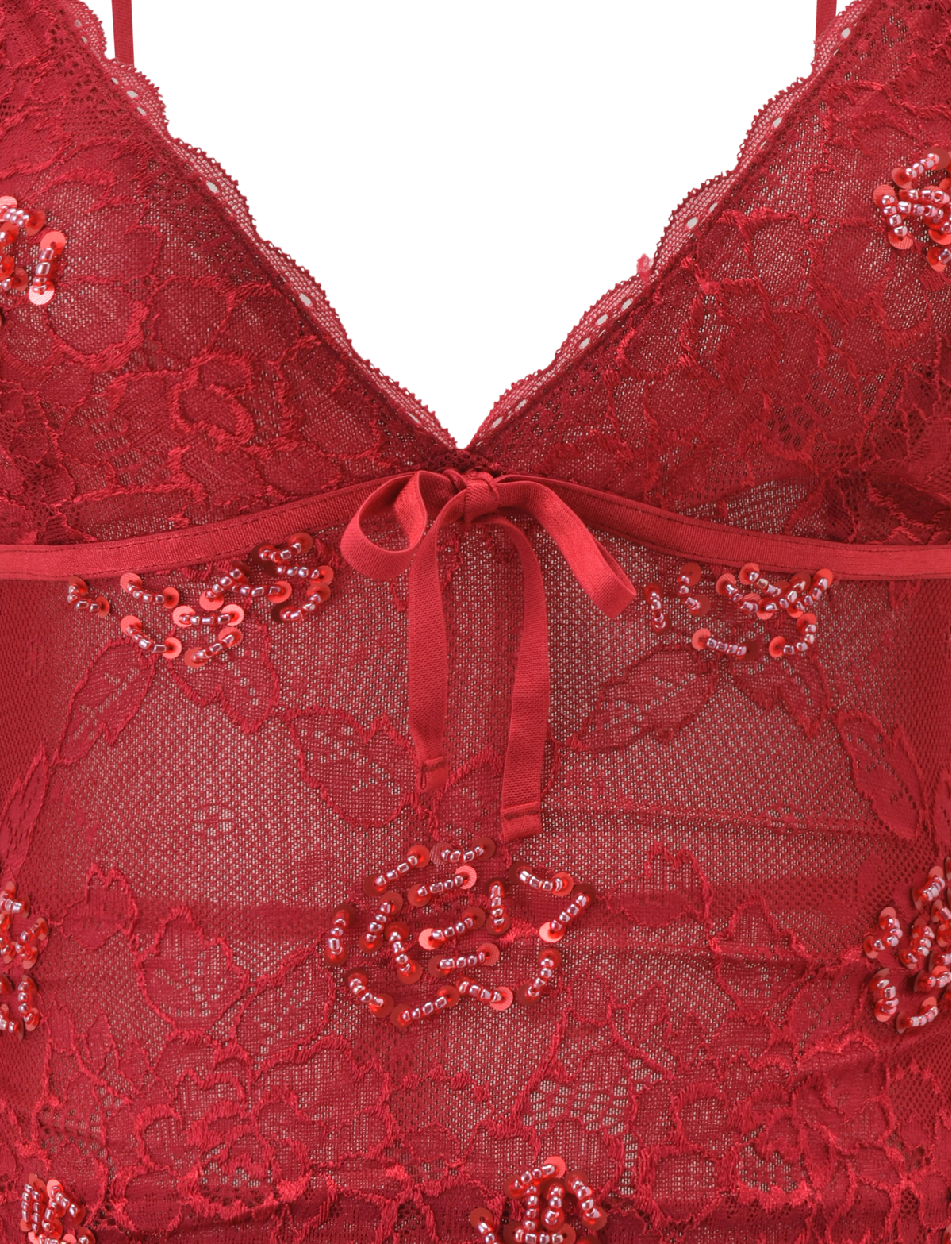 Close-up of the TIGERMIST KIRRA BEADED SEQUIN LACE TOP in red, featuring delicate floral lace, shimmering beads and sequins, plus a satin ribbon bow at the center front.