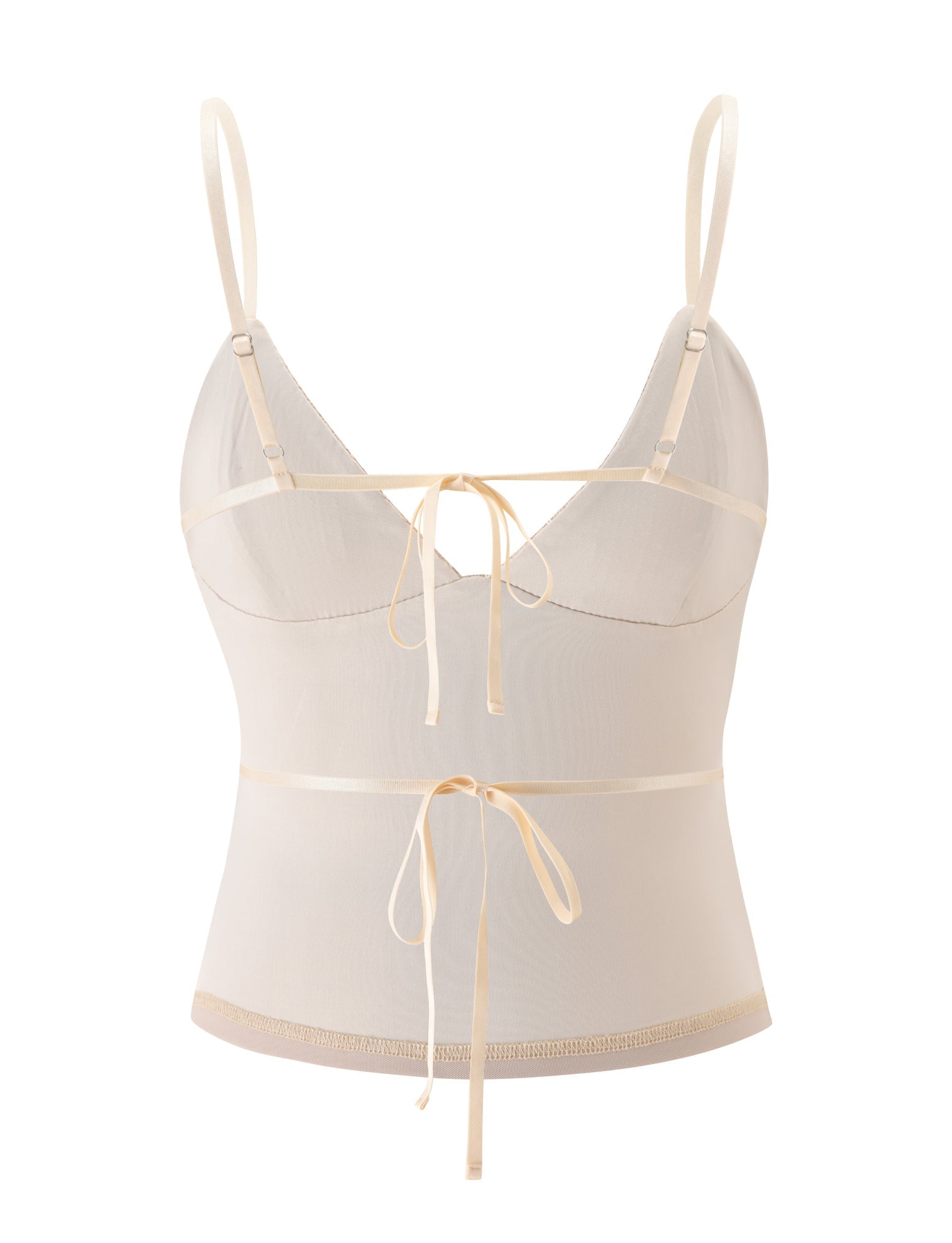 The SYLA TOP - OAT by TIGERMIST is a sheer sequin cami in oat cream, featuring a V-neckline, adjustable thin shoulder straps, and two satin ribbons tied into bows at the bust and waist—an essential addition to your summer wardrobe.