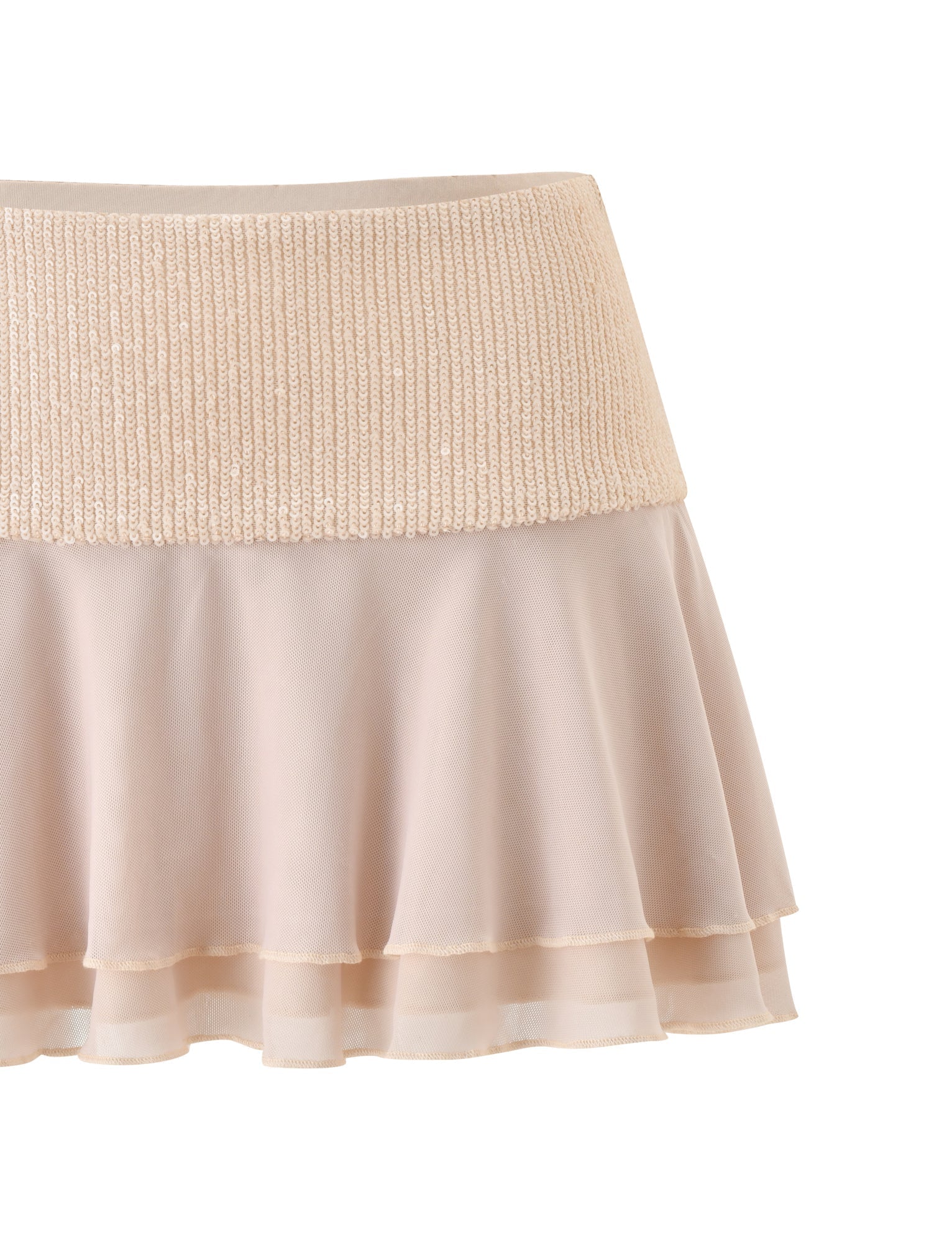 The SYLA MINI SKIRT - OAT by TIGERMIST features a cream beige tone, a wide ribbed knit waistband, and a flowy, tiered flounce chiffon bottom, shown against a white background.
