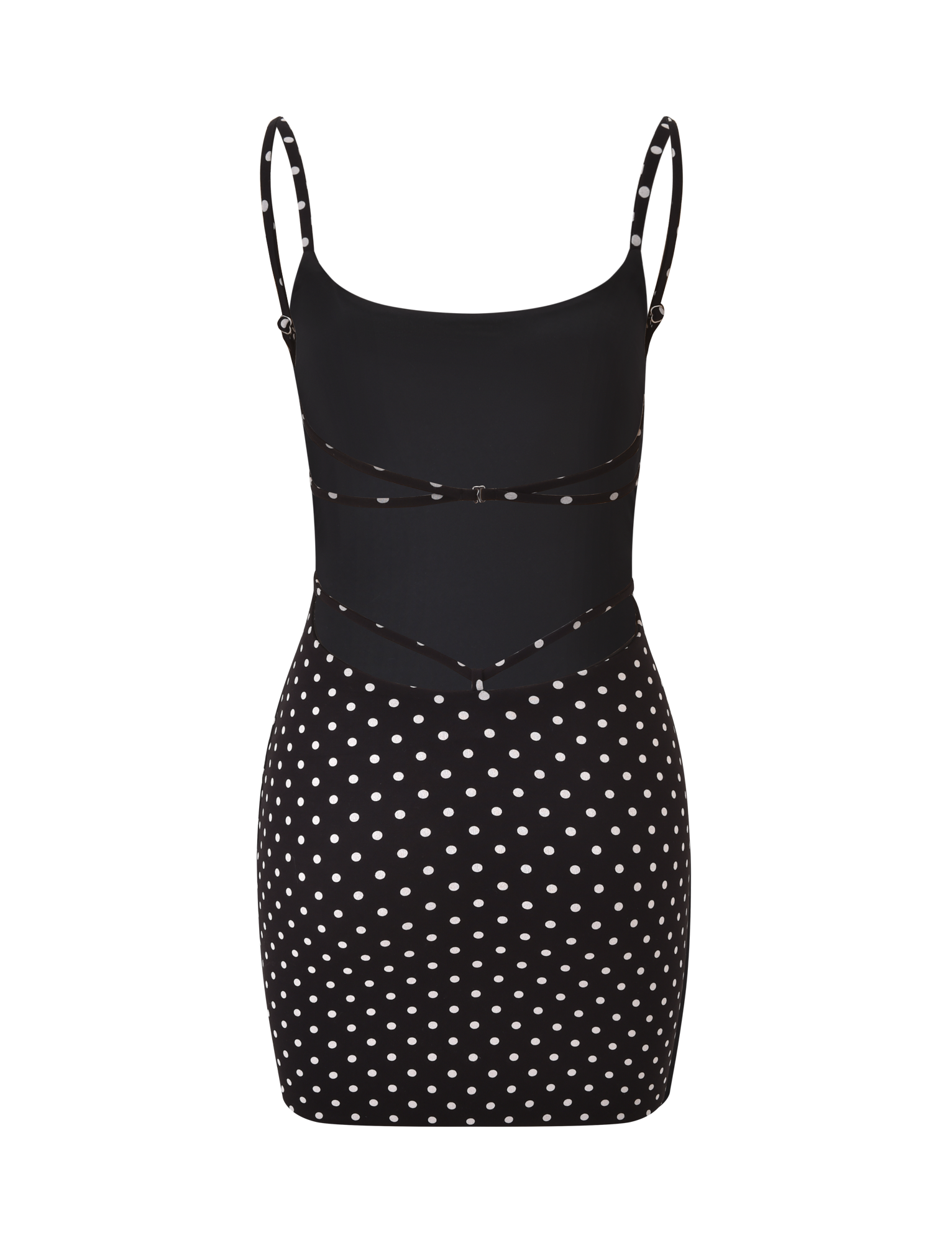 The TIGERMIST MINERVA MINI DRESS 2.0 in black polka dot features adjustable thin straps, white dots on the skirt and lower bodice, plus two slim dotted bands at the midsection for a flattering, playful look.