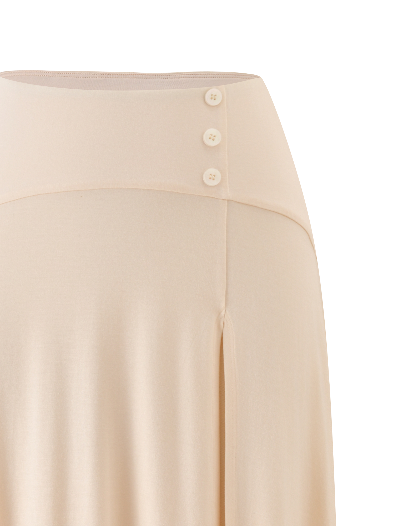 The TIGERMIST ALYSSA HI LO SKIRT in cream showcases a high waistband with three round side buttons, soft flowing fabric, and a stylish front leg slit.