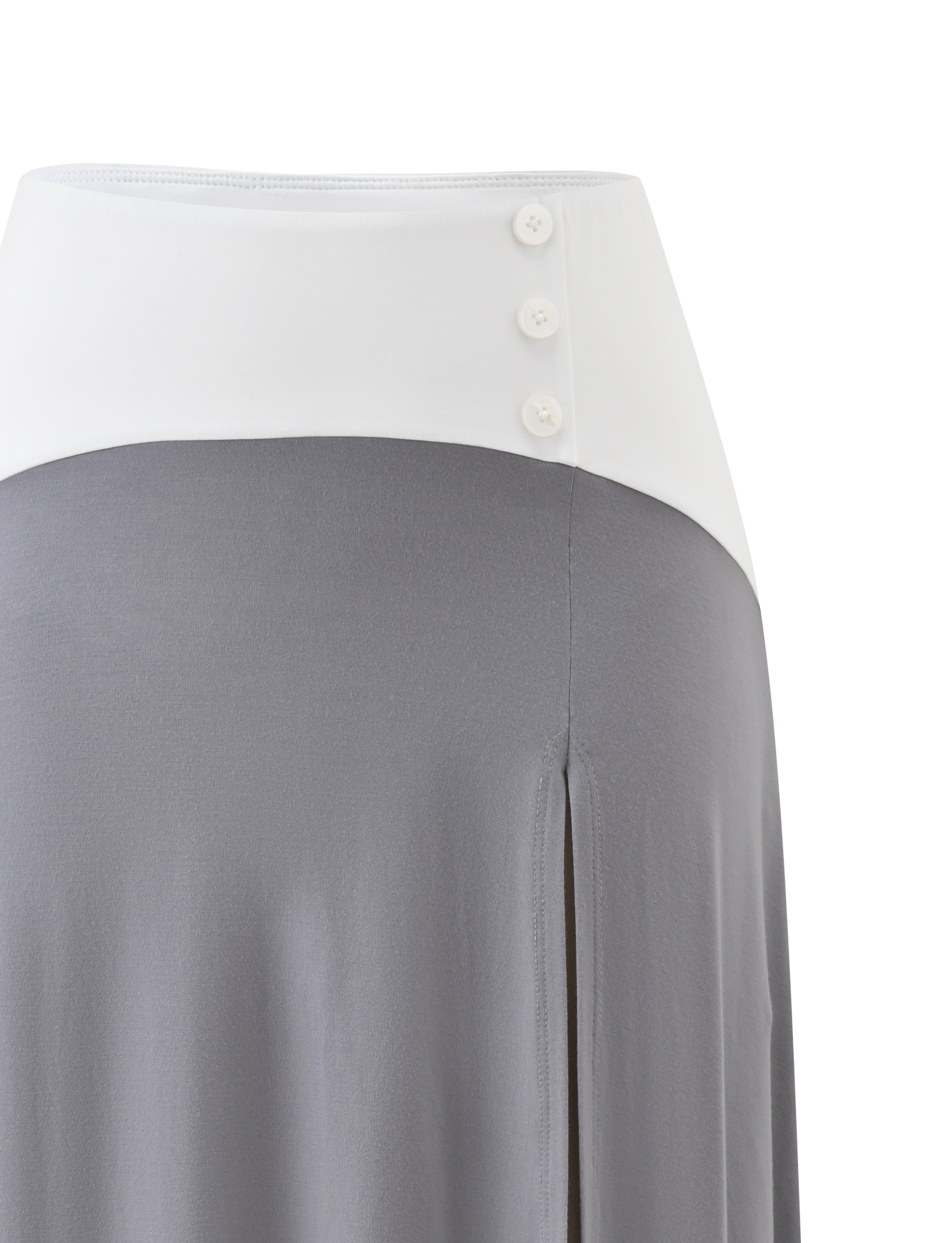 The ALYSSA HI LO SKIRT - GREY by TIGERMIST features a white high waistband with three buttons, a grey flowing lower section, an asymmetrical hem, and a front leg slit.