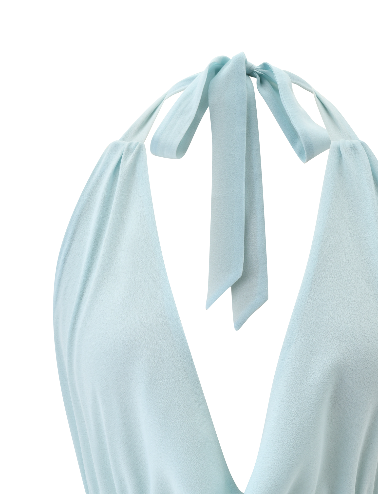 A close-up of the TIGERMIST VEDA OPEN BACK COWL TOP in seafoam, showcasing its adjustable halter neck, deep V neckline, wide straps tied at the open back, and soft flowy fabric.