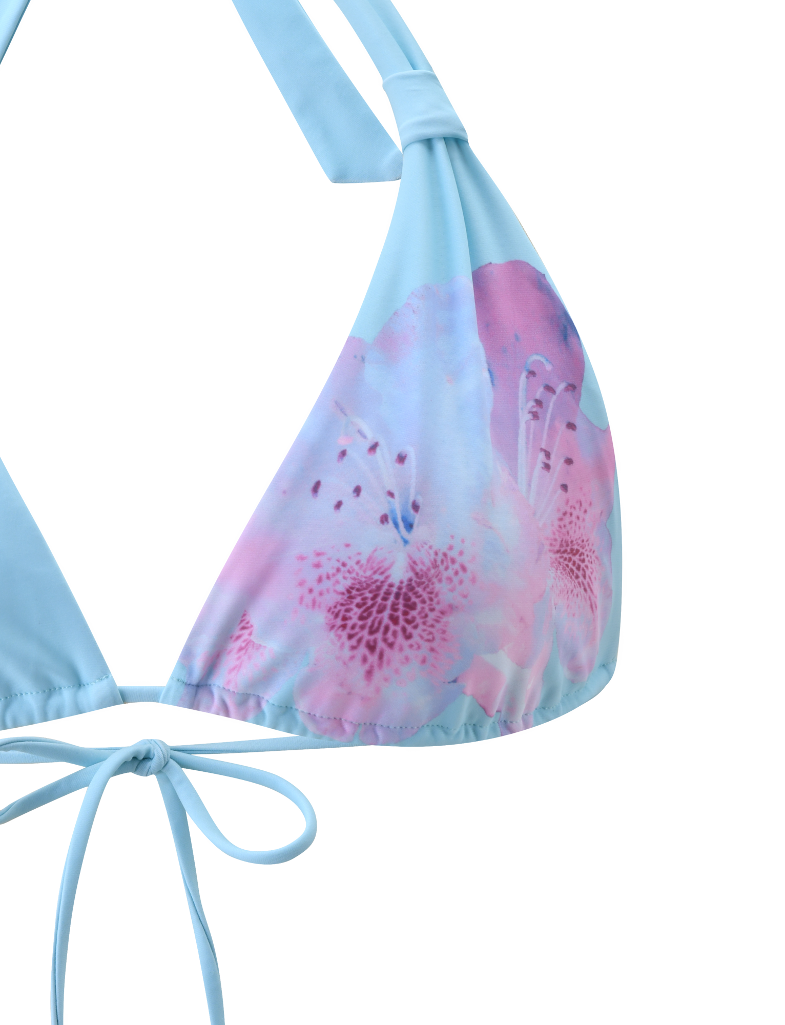 Close-up of the SID BIKINI TOP - BLUE by TIGERMIST, featuring a floral print with a light blue top, pink and purple accents on one cup, and adjustable halter neck and tie-back straps against a plain background.