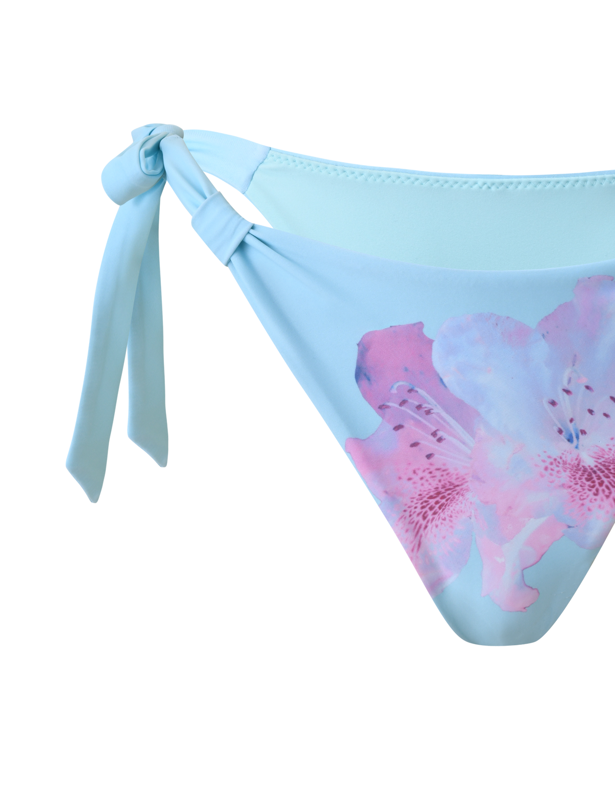 The SID BIKINI BOTTOM - BLUE by TIGERMIST features an adjustable waistline, a left side tie, and a pink and purple floral print on the right, set against a plain white background.