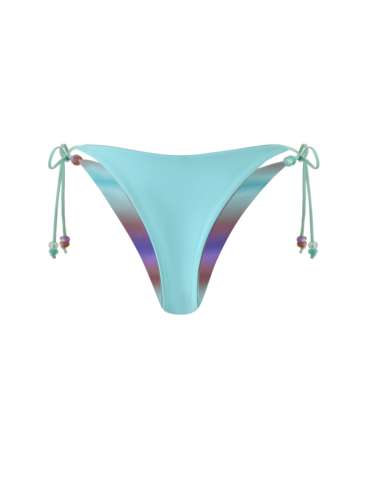The TIGERMIST REVERSIBLE FINLEA BIKINI BOTTOM - MERMAID OMBRE STRIPE features a light blue cheeky cut with adjustable side ties embellished with colorful beads, displayed on a plain white background. The inner lining boasts a reversible design showcasing a vibrant multicolour mermaid ombre stripe with an iridescent gradient effect.
