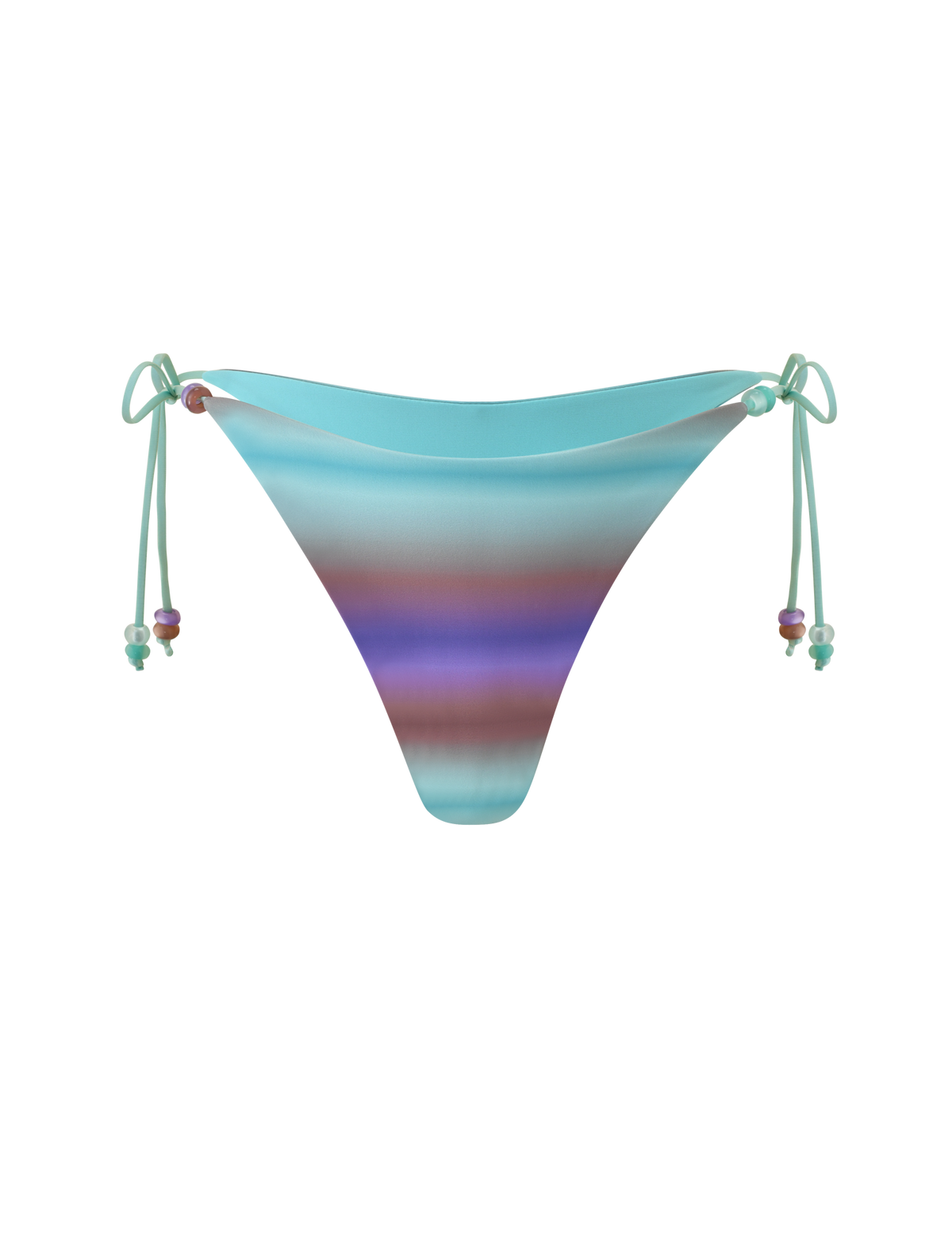 The REVERSIBLE FINLEA BIKINI BOTTOM - MERMAID OMBRE STRIPE by TIGERMIST features a cheeky bikini cut with a multicolour ombre stripe pattern in light blue, purple, and brown horizontal stripes. This bottom is designed with adjustable side ties adorned with small colorful beads and is displayed on a plain white background.