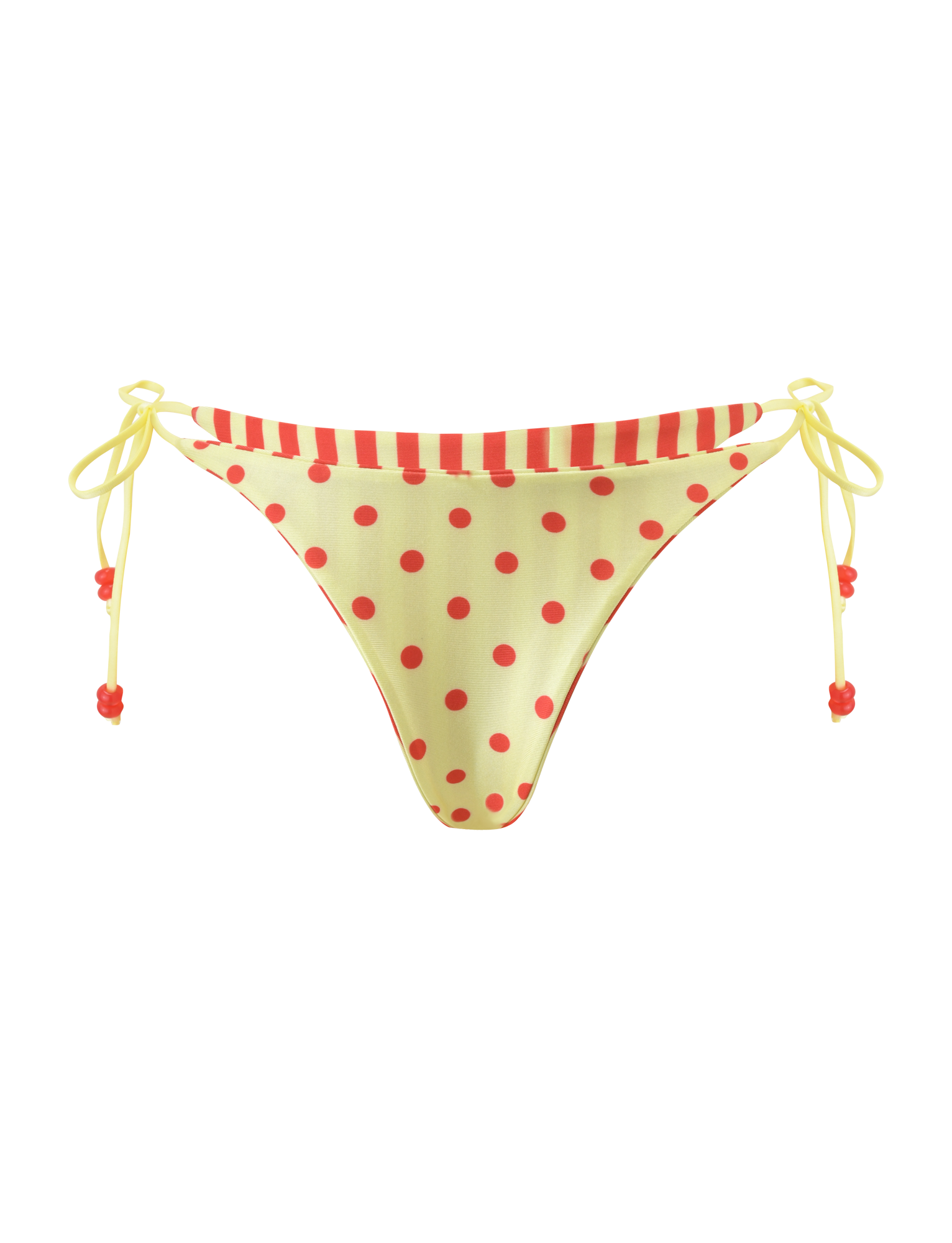 The TIGERMIST FINLEA REVERSIBLE BIKINI BOTTOM features a yellow polka dot print with a cheeky cut, red striped waistband, and yellow side ties with red beads, shown on a plain white background.