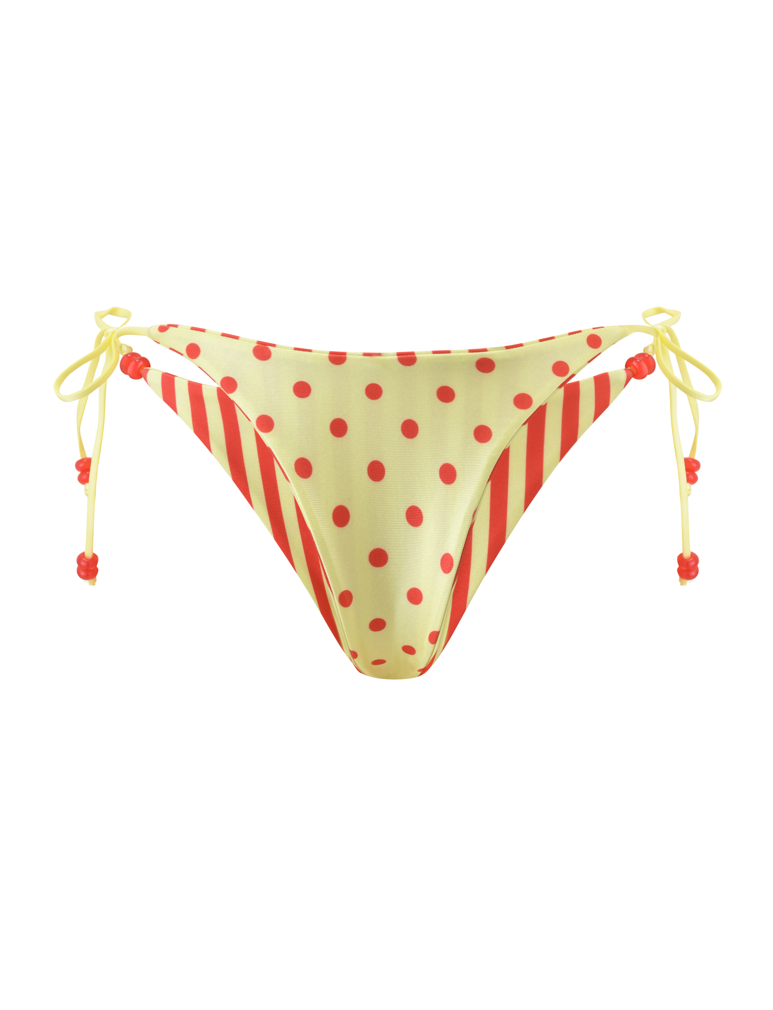 The FINLEA REVERSIBLE BIKINI BOTTOM by TIGERMIST features a cheeky cut with red polka dots and diagonal stripes on yellow, plus side string ties with red bead details for a playful touch.
