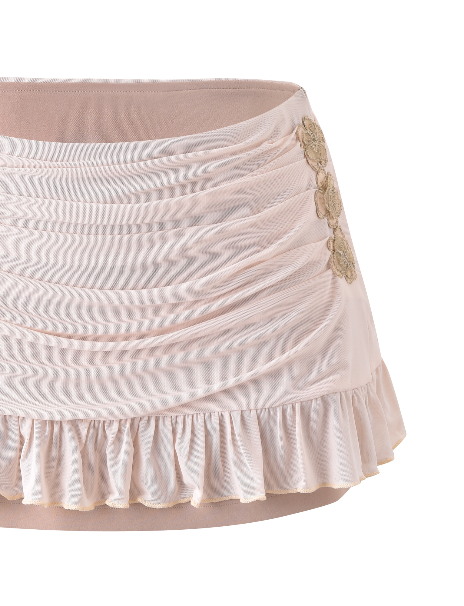 The TIGERMIST TERESE FLORAL APPLIQUE SKIRT in Tan features soft ruching, draped details, a ruffled hem, metallic gold floral appliques on the side, a smooth fitted waistband, and an elegant feminine design.