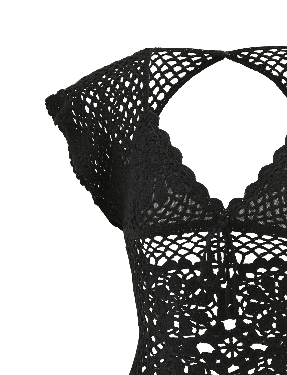 Close-up of the SASHA CROCHET TOP in black by TIGERMIST, featuring short sleeves, a scalloped neckline, openwork floral crochet, intricate stitching, resort-inspired style, and a small front-center tie detail.