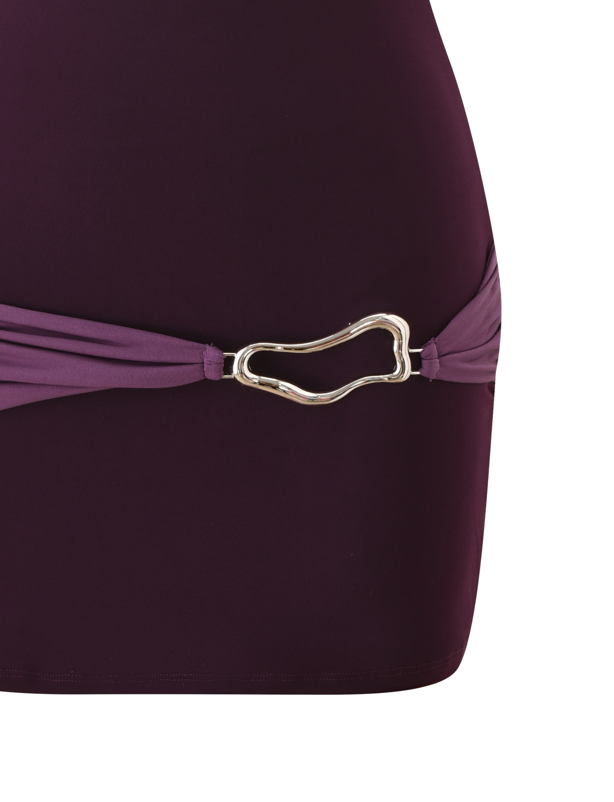Close-up of the TIGERMIST EOS MINI DRESS in aubergine and iris, featuring dark and light purple color blocking, hip gathering, and a gold irregular-shaped metal buckle. Set against a white background.