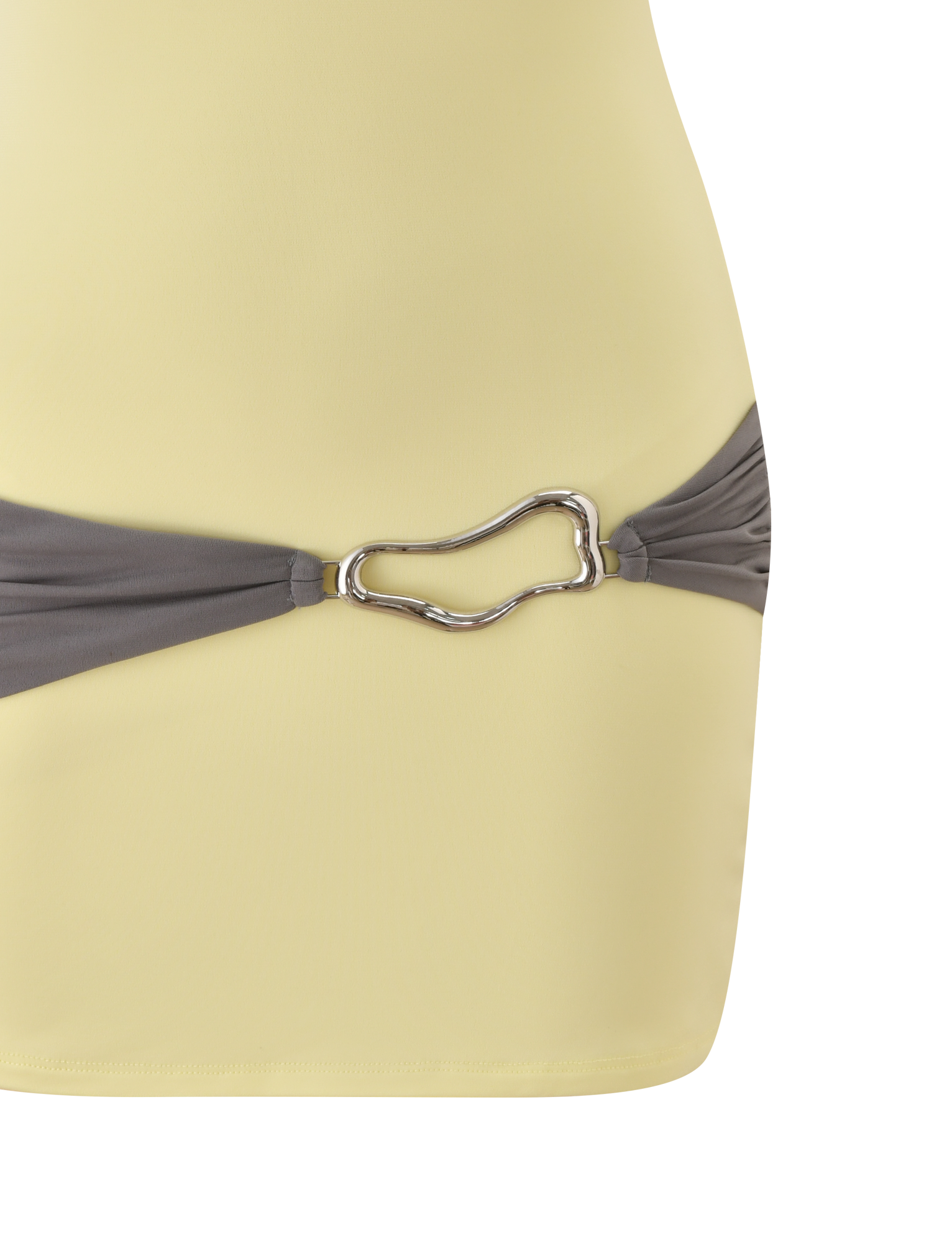 Close-up of the TIGERMIST EOS MINI DRESS in butter yellow and grey, featuring color blocking, gray draped detail at the hip, and a silver, irregular-shaped metal buckle.