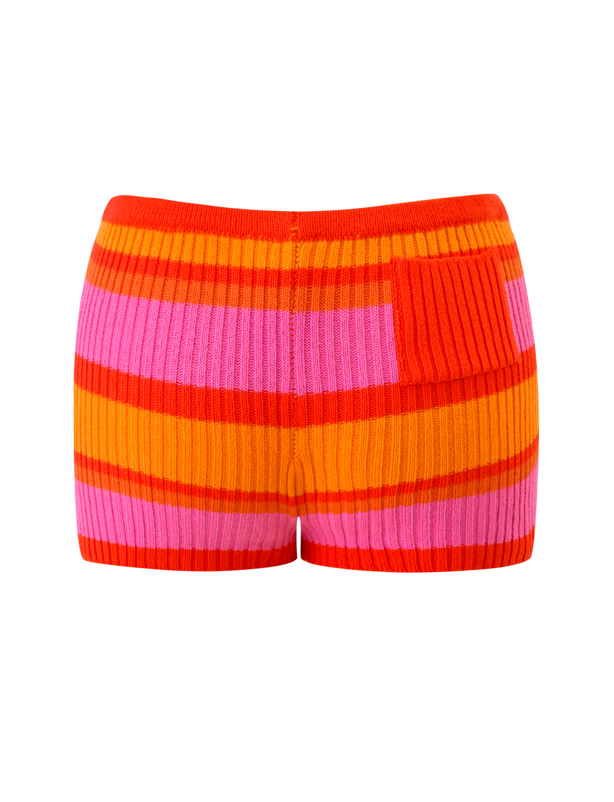 The EVERLY KNIT SHORT - SUNSET TROPICAL STRIPE by TIGERMIST features horizontal red, orange, and pink stripes with a unique pattern, fitted high-waist design, elastic waistband, ribbed texture, and a small textured patch.