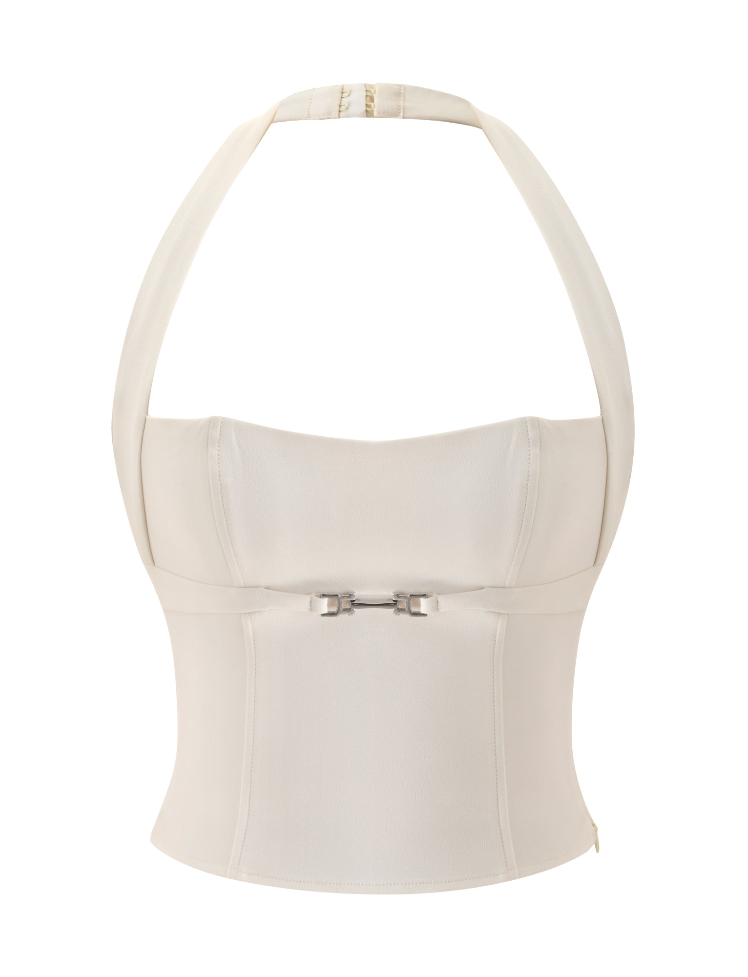 The KITTIE BUCKLE TOP in cream by TIGERMIST features an elegant off-white, backless halter corset design with structured cups, a central metal buckle detail, and a flattering fitted waist—making it the perfect bridal shower top—shown against a plain white background.