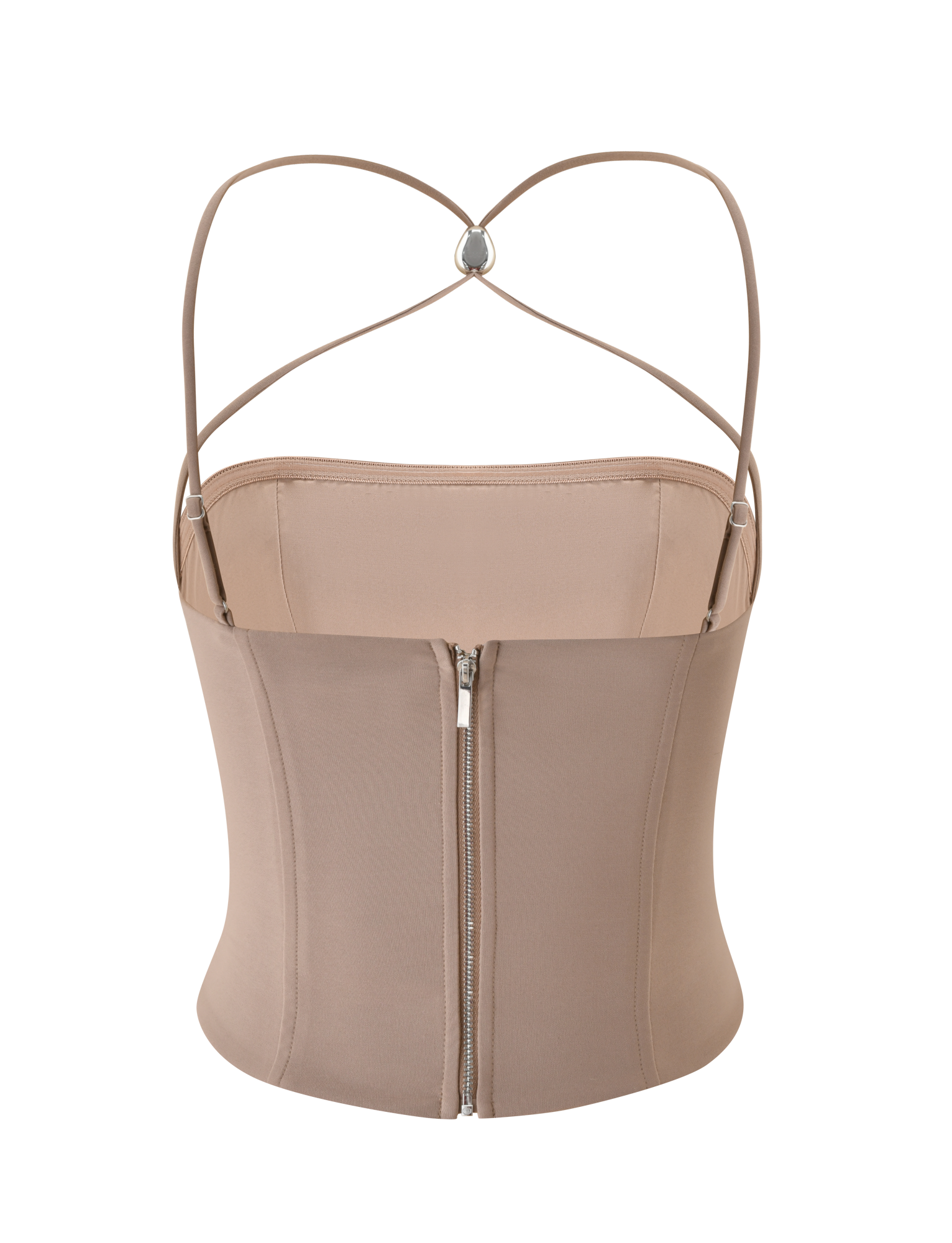 The TAMORA CORSET TOP by TIGERMIST is a taupe, fitted top with thin adjustable straps, a sweetheart neckline, and a visible silver back zipper. The 90’s-inspired straps form a heart shape with a ring at the crossing on the back.