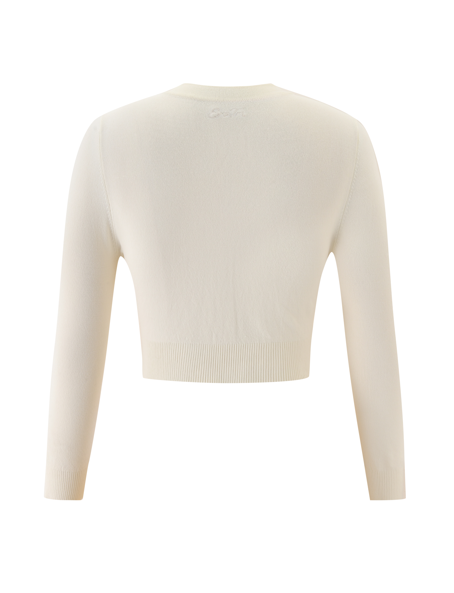 Back view of the TIGERMIST DAMARIS CARDIGAN in cream, a cropped knit sweater with a minimalist design and no visible buttons or embellishments, shown against a plain white background.