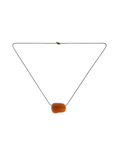 The TIGERMIST ALILAH NECKLACE - AMBER is a minimalist black cord necklace with a single smooth, oval amber bead pendant, shown on a plain white background.