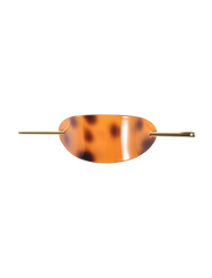 The TIGERMIST RUKA BARETTE - TORTOISESHELL is an oval, acrylic tortoiseshell hair clip with a stylish gold bar closure threaded through side openings, shown against a plain white background.