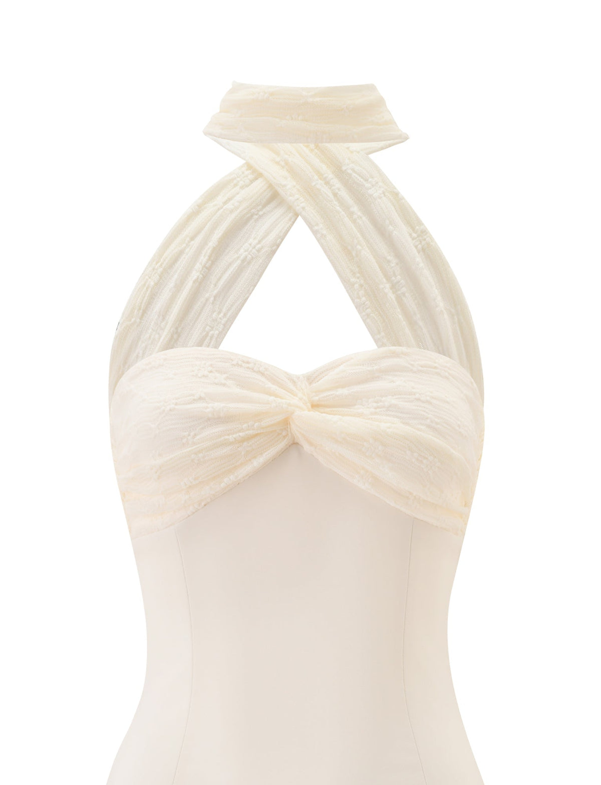 The LYRA MINI DRESS in Cream by TIGERMIST features a fitted corset bodice, sweetheart neckline, and crisscross halter straps crafted from textured, sheer fabric.