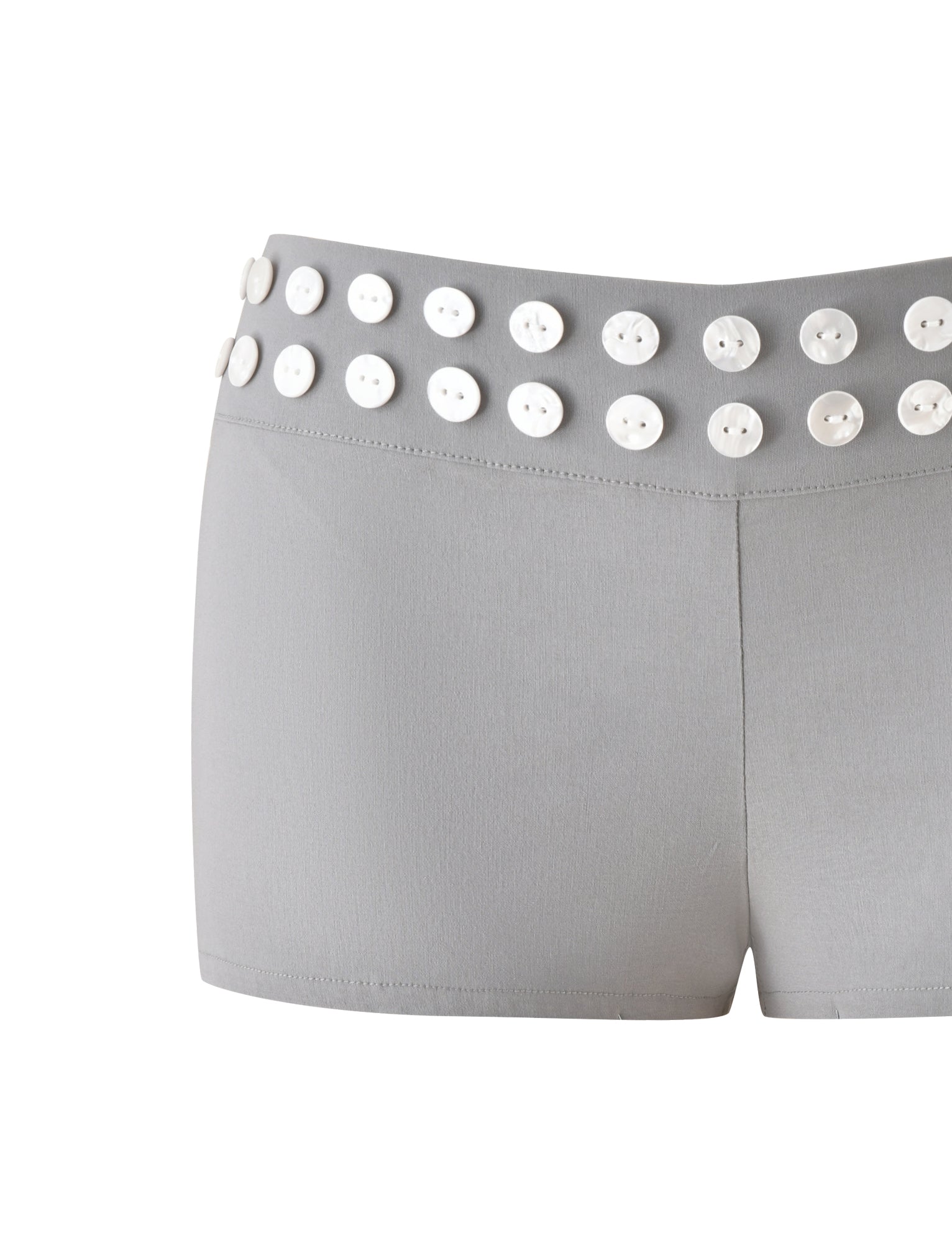 The SUKI SHORT - GREY by TIGERMIST features a tailored silhouette and two rows of faux shell buttons adorning the waistband, shown against a white background.