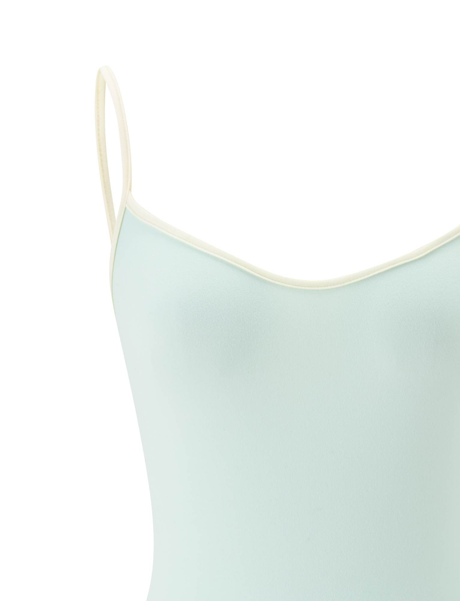 Close-up of the TIGERMIST GREER TOP in mint green, featuring adjustable spaghetti straps and cream trim on the scoop neckline, shown against a plain white background.