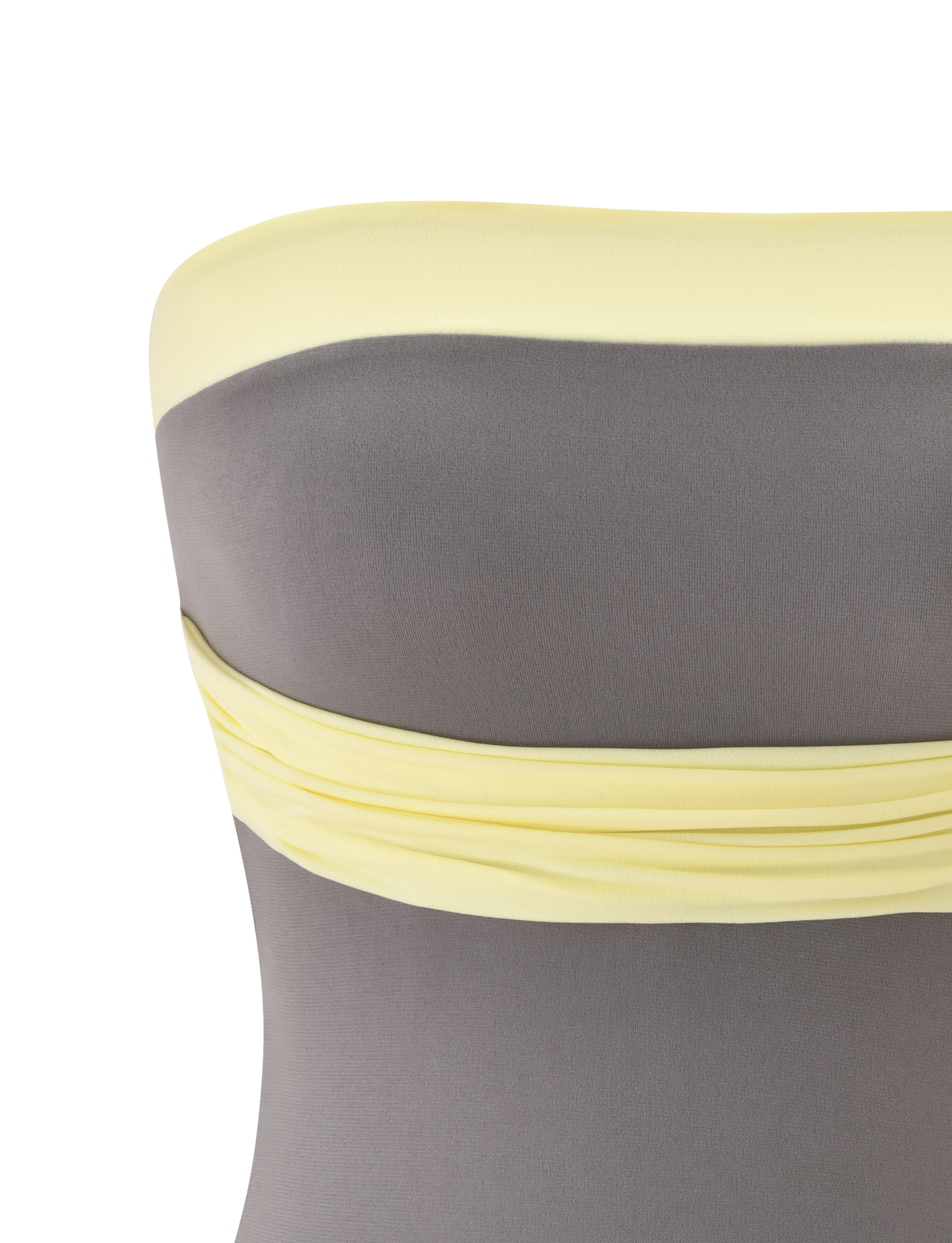A close-up of the TIGERMIST EOS TOP - GREY AND YELLOW shows a strapless neckline, grey body, pale yellow trim, and gathered detailing along the top edge on a white background.