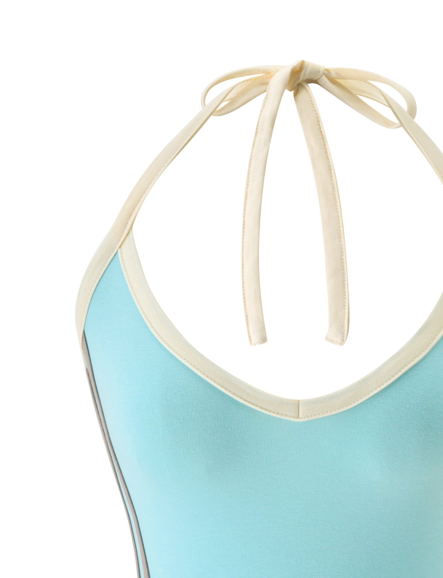 The ALYSIA TOP - AQUA by TIGERMIST is a fitted women’s halter neck top featuring cream-colored contrast binding stripes and ties. Shown from the neck to upper torso against a white background, the image highlights the neckline and elegantly tied straps.