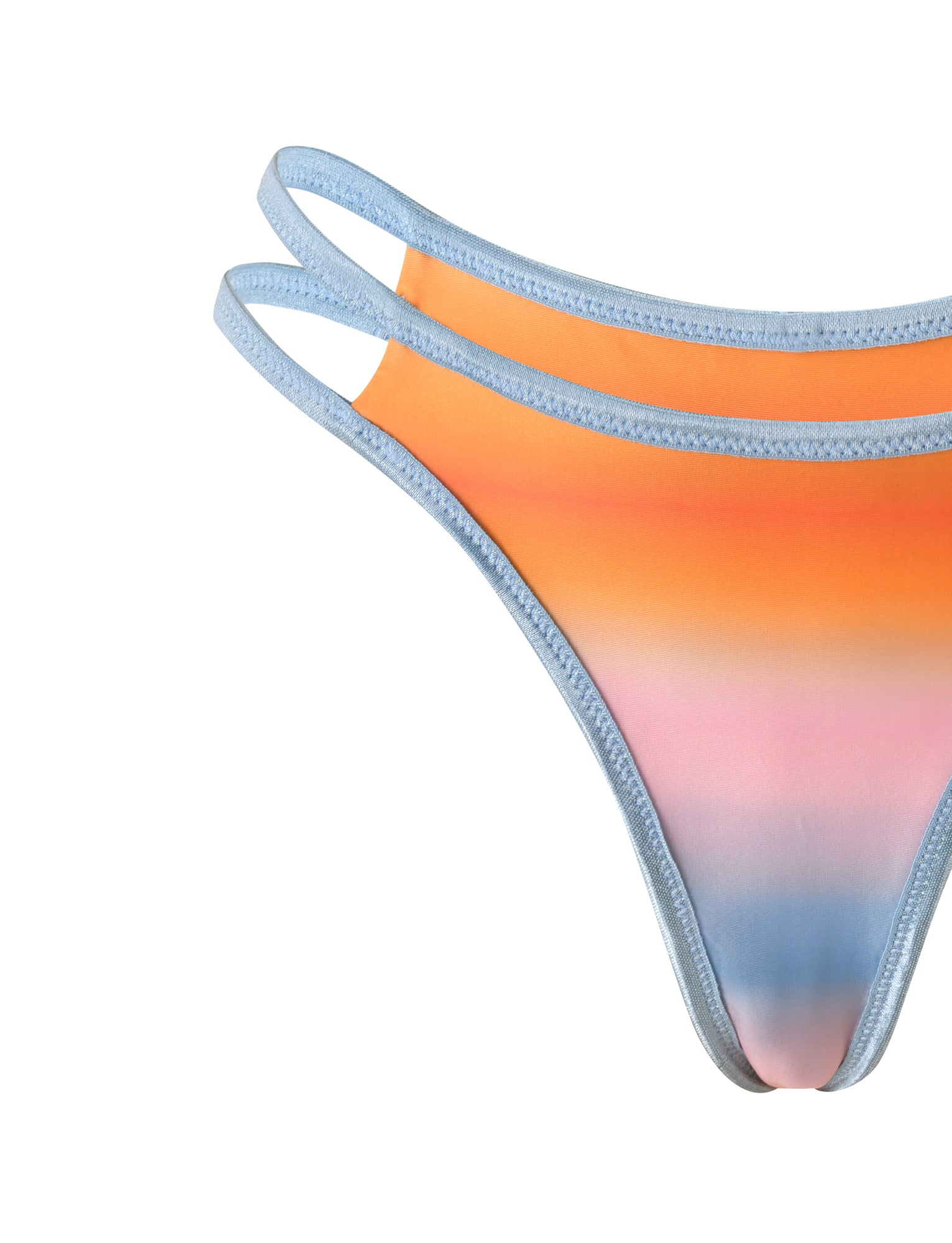 The TIGERMIST EMERSON REVERSIBLE BIKINI BOTTOM in orange and blue plaid ombre print features double blue straps and a smooth fabric with a cheeky fit for a playful vibe. Only part of the swimsuit is shown against a white background.