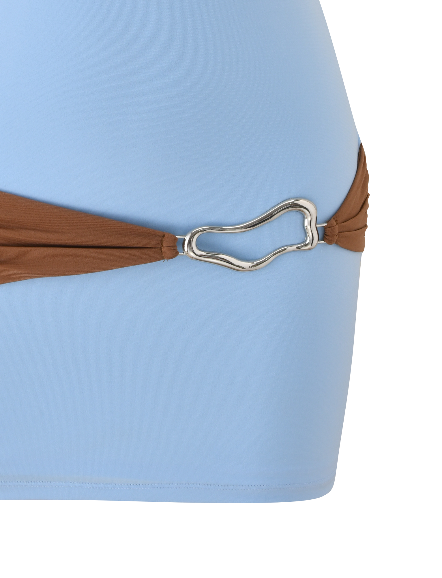 Close-up of the TIGERMIST EOS MINI DRESS in soft blue and mocha, showcasing a brown strap with a silver, irregularly shaped metal buckle detail on the side.