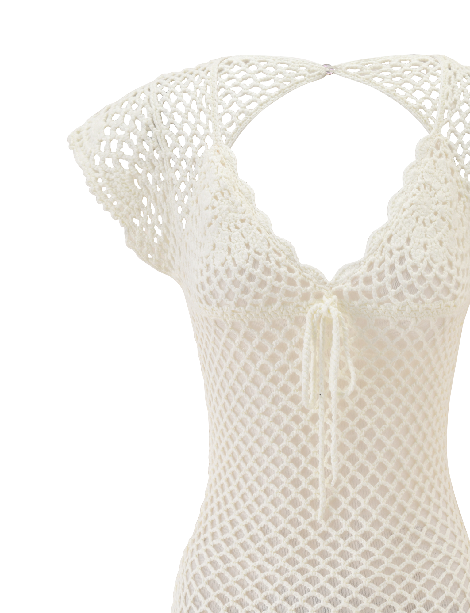 A close-up of the TIGERMIST SASHA CROCHET MINI DRESS in white, featuring cap sleeves, a V-neckline, scalloped edges, and a front tie—ideal as a chic swim cover-up or vacation dress—displayed on a plain white background.