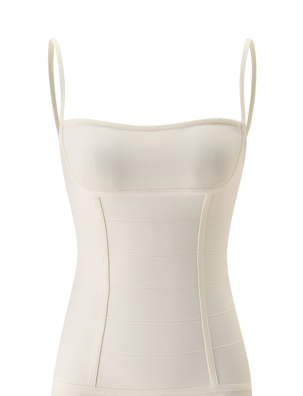 The TAHNIA BANDAGE MINI DRESS in cream by TIGERMIST features thin adjustable straps and panel detailing on the front, designed to create a corseted silhouette and bodycon fit, shown on a white background.