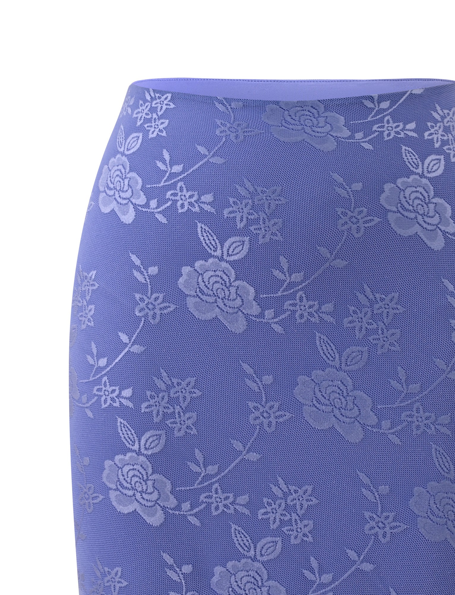 A close-up of the ORLY MIDI SKIRT by TIGERMIST in Cornflower Blue Tonal, featuring a floral lace pattern with roses and leaves in slightly lighter blue tones, capturing the elegant 90′s midi silhouette.