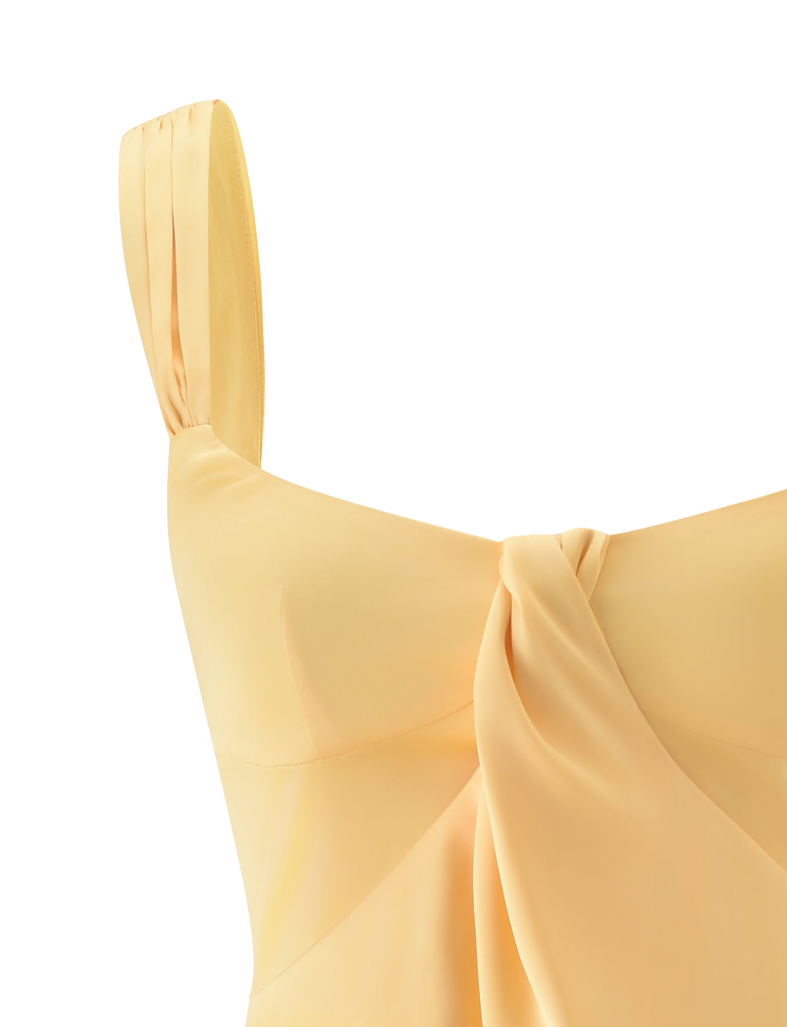 Close-up of the TIGERMIST STAV MINI DRESS in butter yellow, showcasing its A-line silhouette with a pleated shoulder strap and front knot detail, set against a white background.