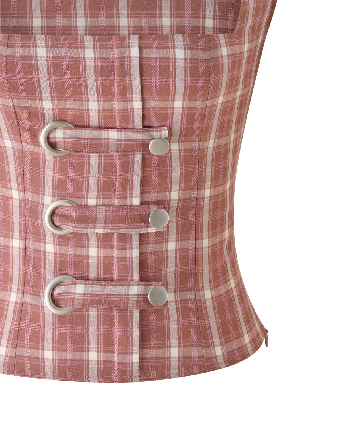 A close-up of the MIKA TOP - PINK PLAID by TIGERMIST, showcasing three silver buttons and two vertical fabric tabs with metal loops on the front, perfectly paired with delicate puff sleeves and a flattering square neckline.