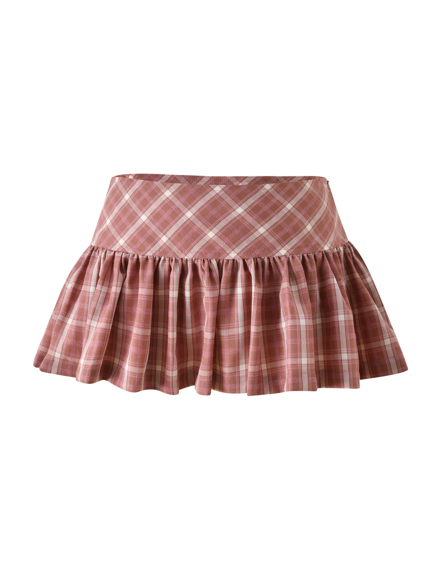 The MIKA SKORT - PINK PLAID by TIGERMIST is an A-line mini skort featuring intersecting white and light pink plaid lines, a fitted waistband, and a ruffled, flared hem. Crafted from lightweight fabric, it offers both comfort and style.