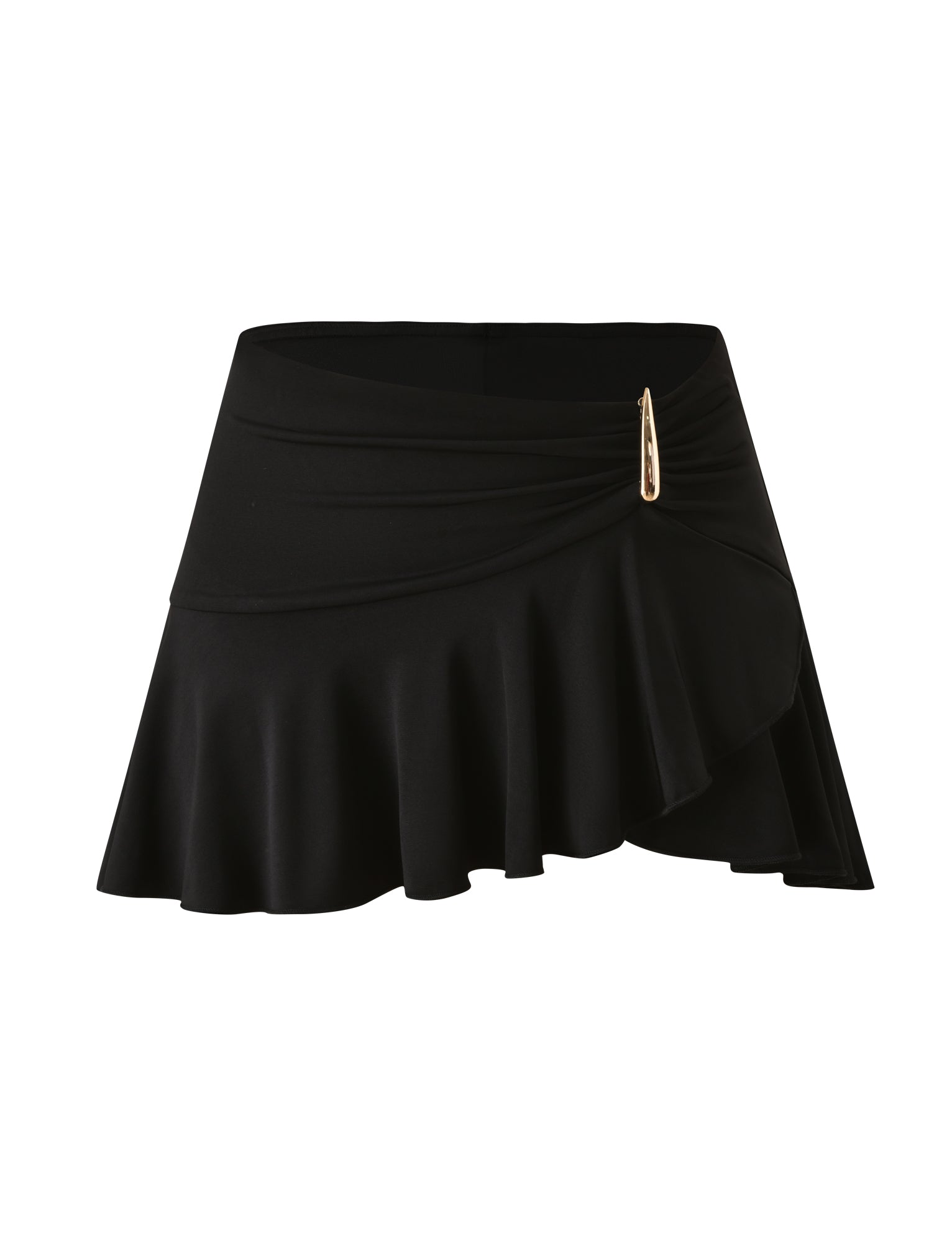 The SOLIA MINI SKIRT by TIGERMIST features a black flounce silhouette with a ruffled hem and gold pin detail accenting the waistband. The front wrap design creates a chic, layered look.