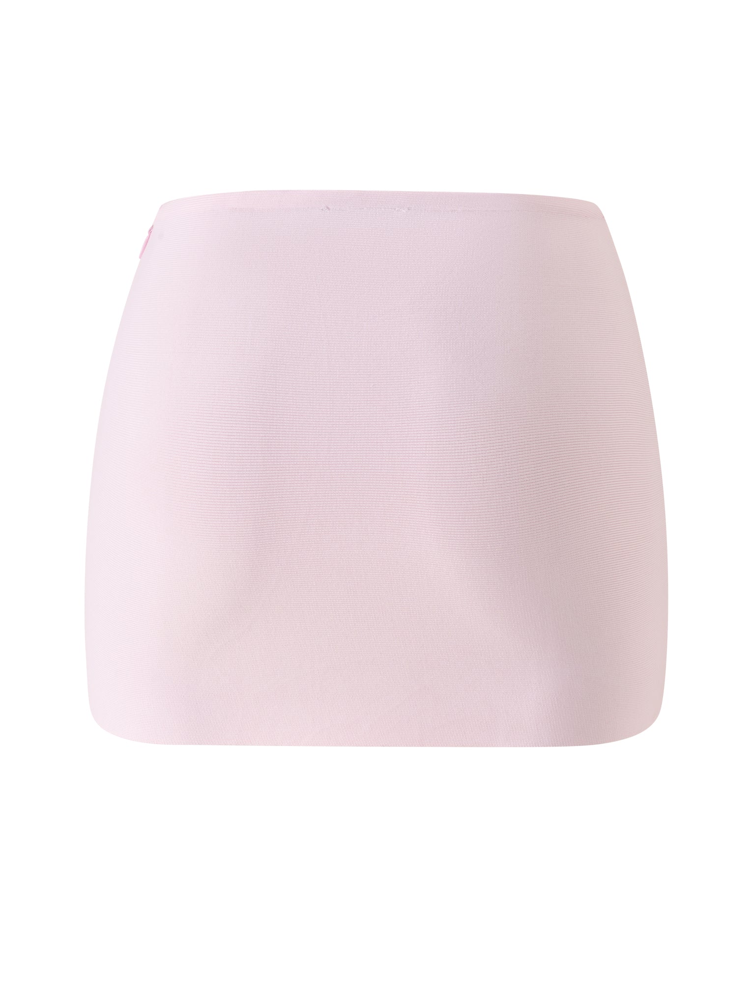 The TAHNIA BANDAGE MINI SKIRT in Ballet Pink by TIGERMIST is showcased on a white background, displayed from the front. This plain, baby pink bodycon mini skirt features a sleek and flattering silhouette with no visible patterns, buttons, or zippers and is crafted from sculpting bandage material.