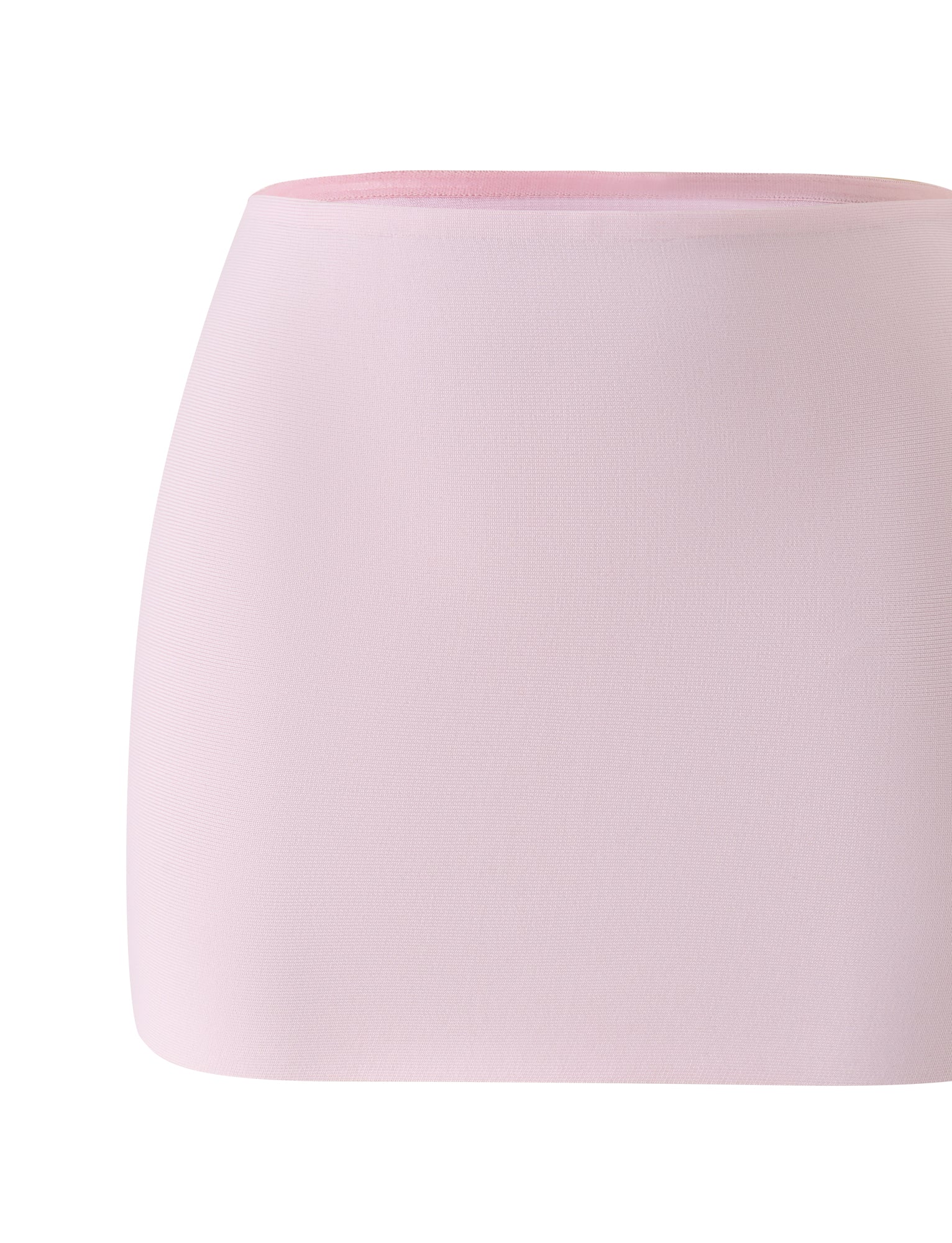 The TAHNIA BANDAGE MINI SKIRT - BALLET PINK by TIGERMIST is a simple, straight-cut mini skirt crafted from sculpting bandage material in a soft baby pink shade. With its smooth texture and minimalist design, it features no visible patterns, pockets, or decorations and is displayed against a white background.
