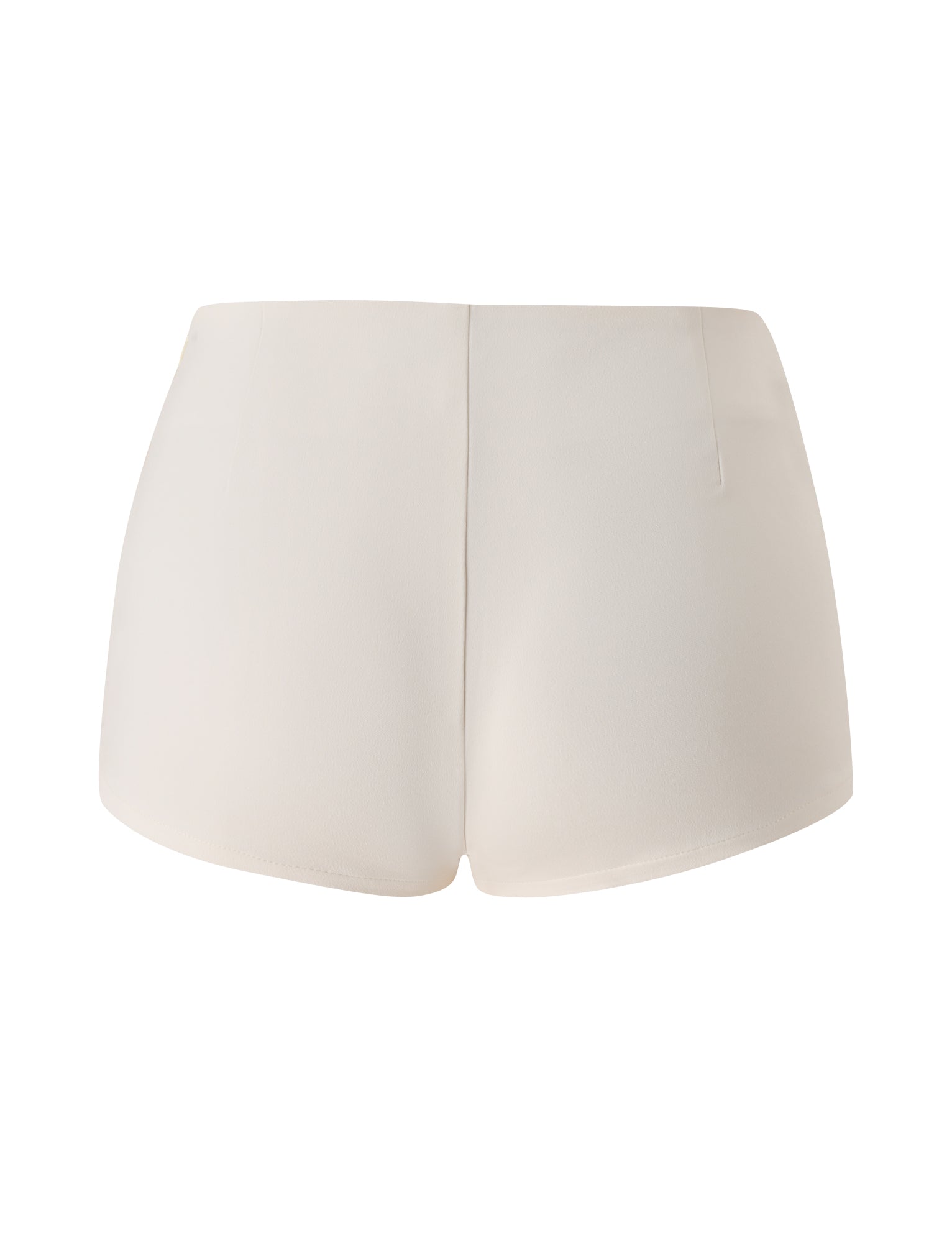 Back view of the TIGERMIST KITTIE BUCKLE SHORT in cream, a high-waisted pair crafted from stretch suiting fabric, displayed against a white background.