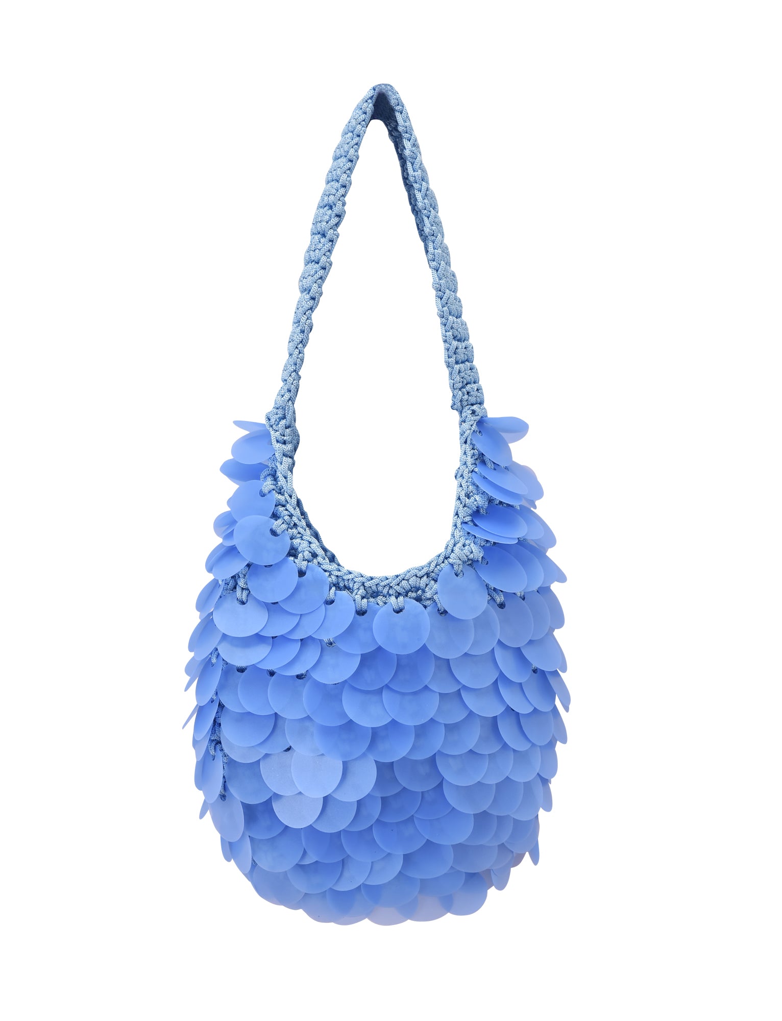 The CLEO BAG - BRIGHT BLUE by TIGERMIST features a woven handle and is adorned with layered, round, flat discs for a textured, scale-like look—making it the perfect stylish beach bag for sunny days.