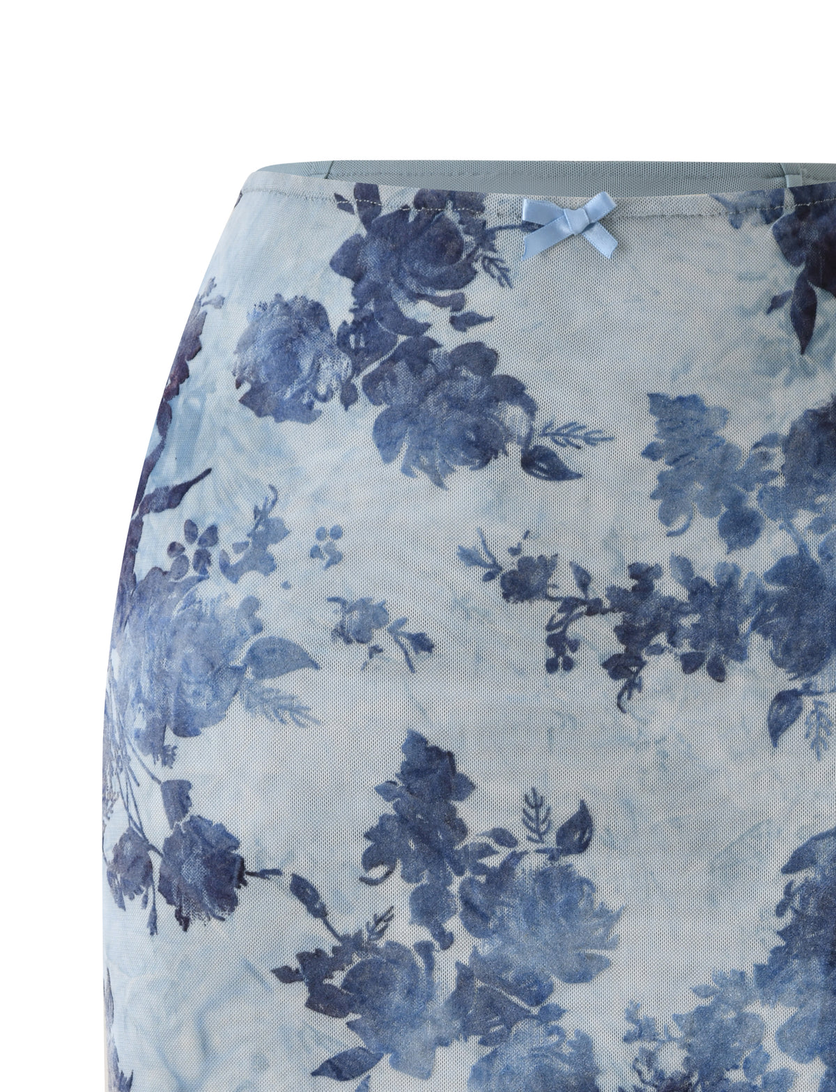ELLIOT MIDI SKIRT - DUSTY BLUE featuring a dark blue rose print on dusty blue mesh and a small ribbon bow at the waist.