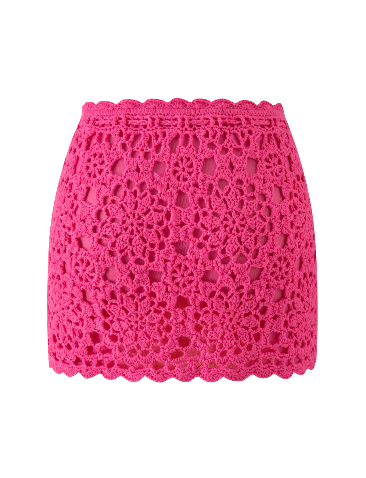 The SASHA CROCHET MINI SKIRT - HOT PINK by TIGERMIST features a vibrant floral crochet pattern and scalloped edges, ideal for vacations, shown against a plain white background.