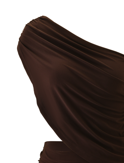 Close-up of the TIGERMIST RYLAND DRAPED MINI DRESS in chocolate, featuring a one-shoulder draped design and gathered fabric for soft folds and a smooth texture, shown against a white background.