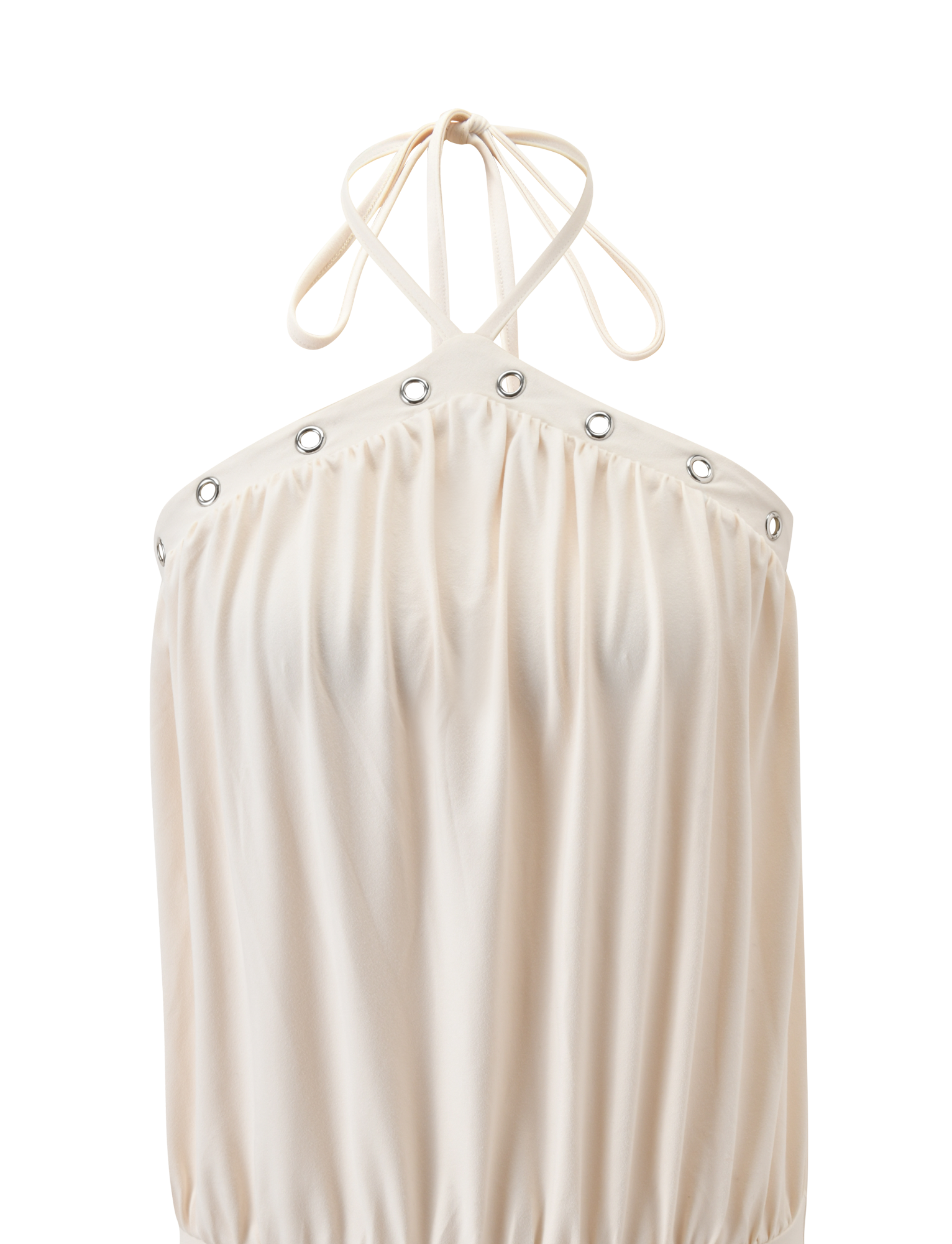 The NATASHA DRESS - CREAM by TIGERMIST features a halter neckline with thin tie straps, silver grommet accents along the top edge, a gathered flowing texture, and a stylish bubble hem.