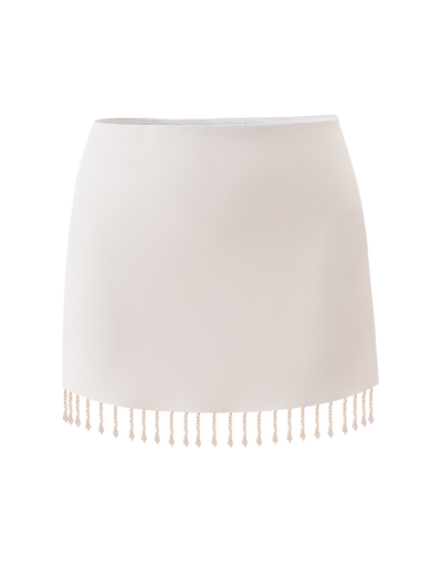 The AUBRIELLA TASSLE MINI SKIRT by TIGERMIST features a cream hue, simple straight cut, and playful beaded tassel fringe along the hem for a stylish touch.