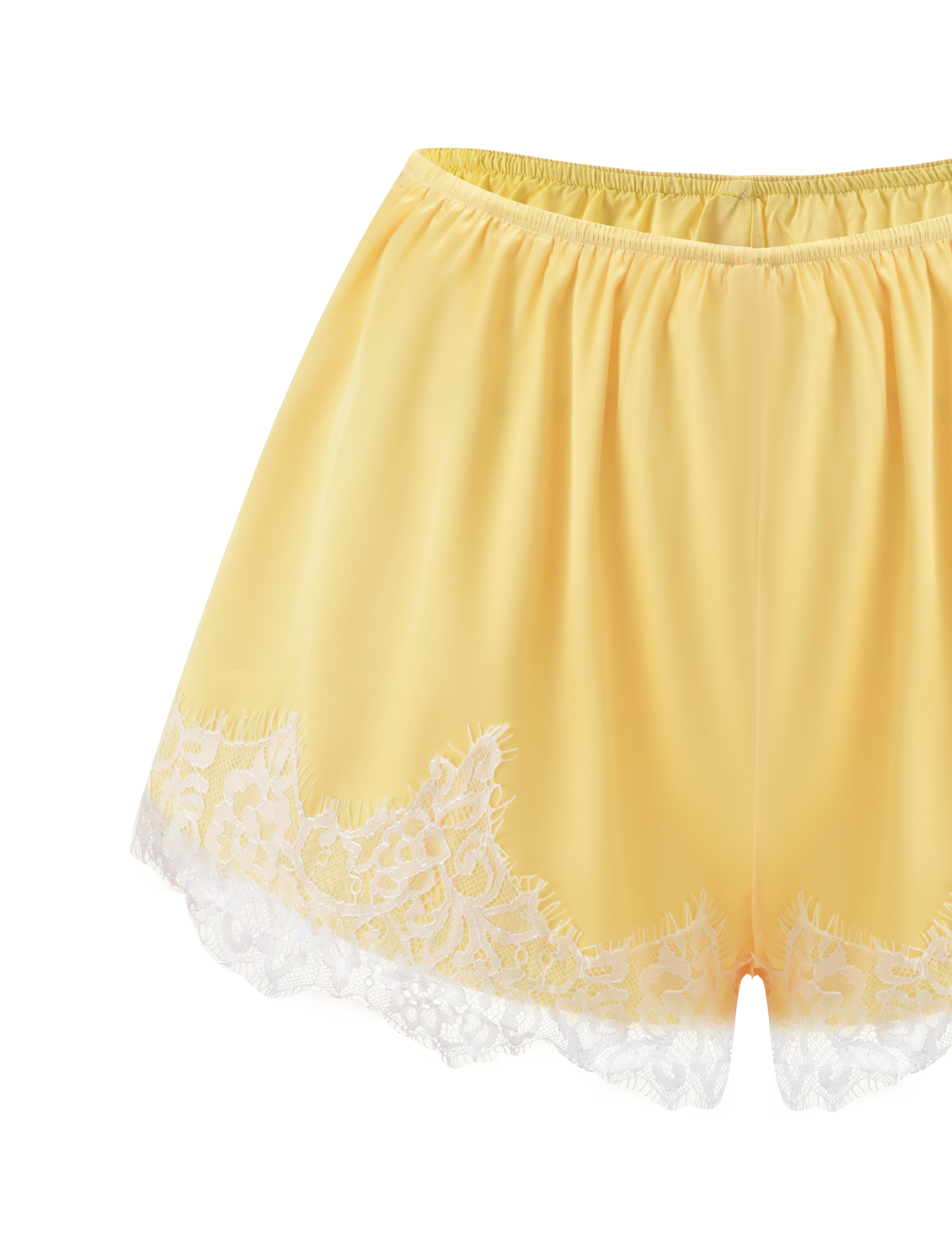 The SOLSTICE SHORT-YELLOW by TIGERMIST features soft yellow satin, white lace trim at the hem, and an elastic waistband. Style these flowy mini shorts as a matching set for an elegant, coordinated look.