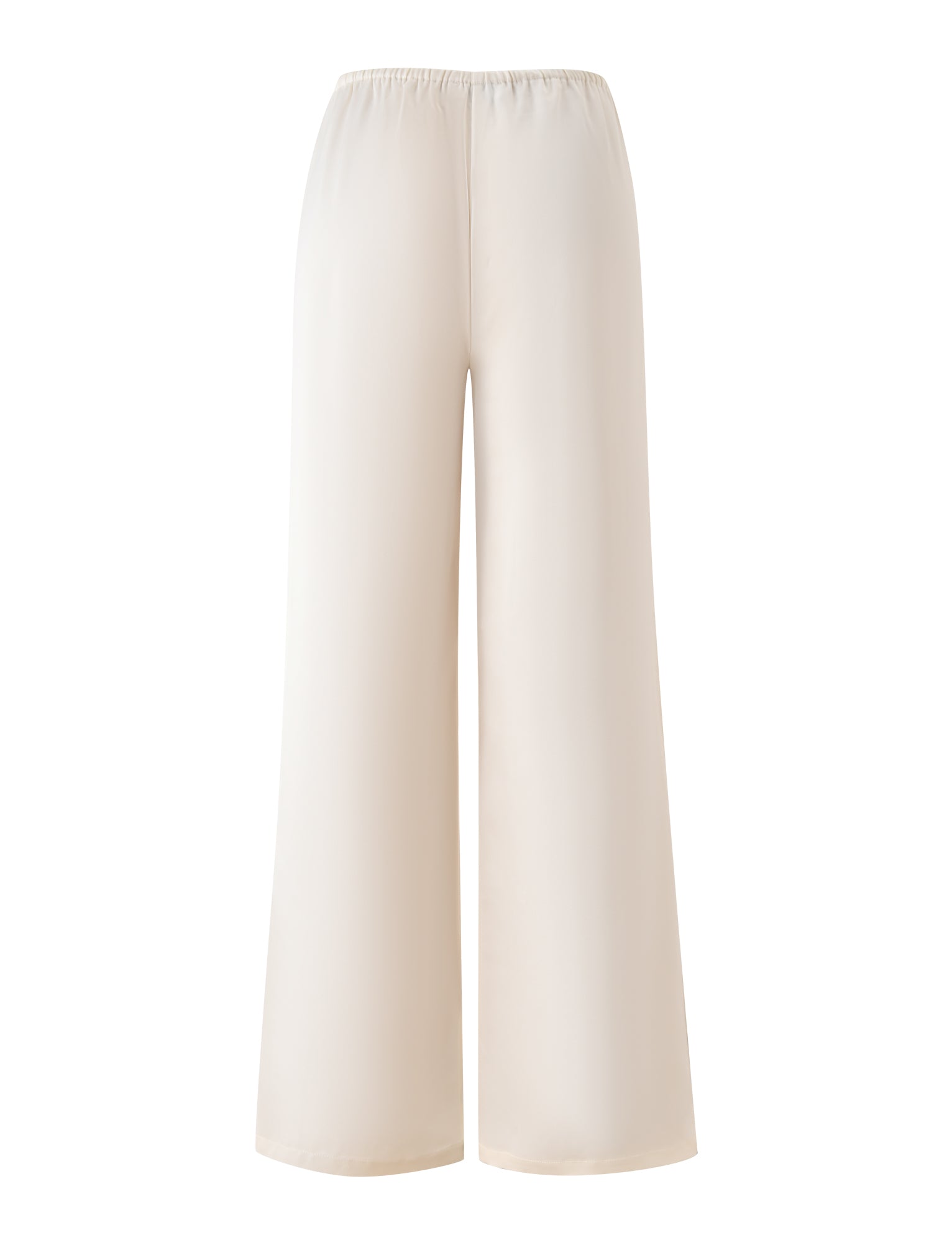 The TIGERMIST MAURA PANT – WHITE features wide legs and a high rise, crafted from drapey satin with an elastic, adjustable waistband. Shown from the front against a white background, these pants combine comfort and elegance for an effortlessly chic style.
